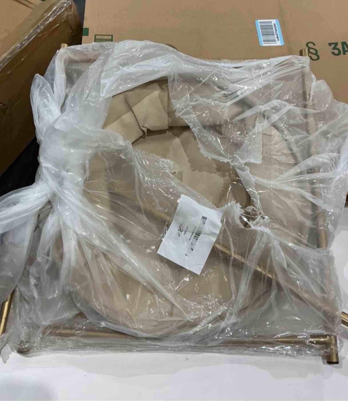 Condition photo showing As Is for gold laundry basket 