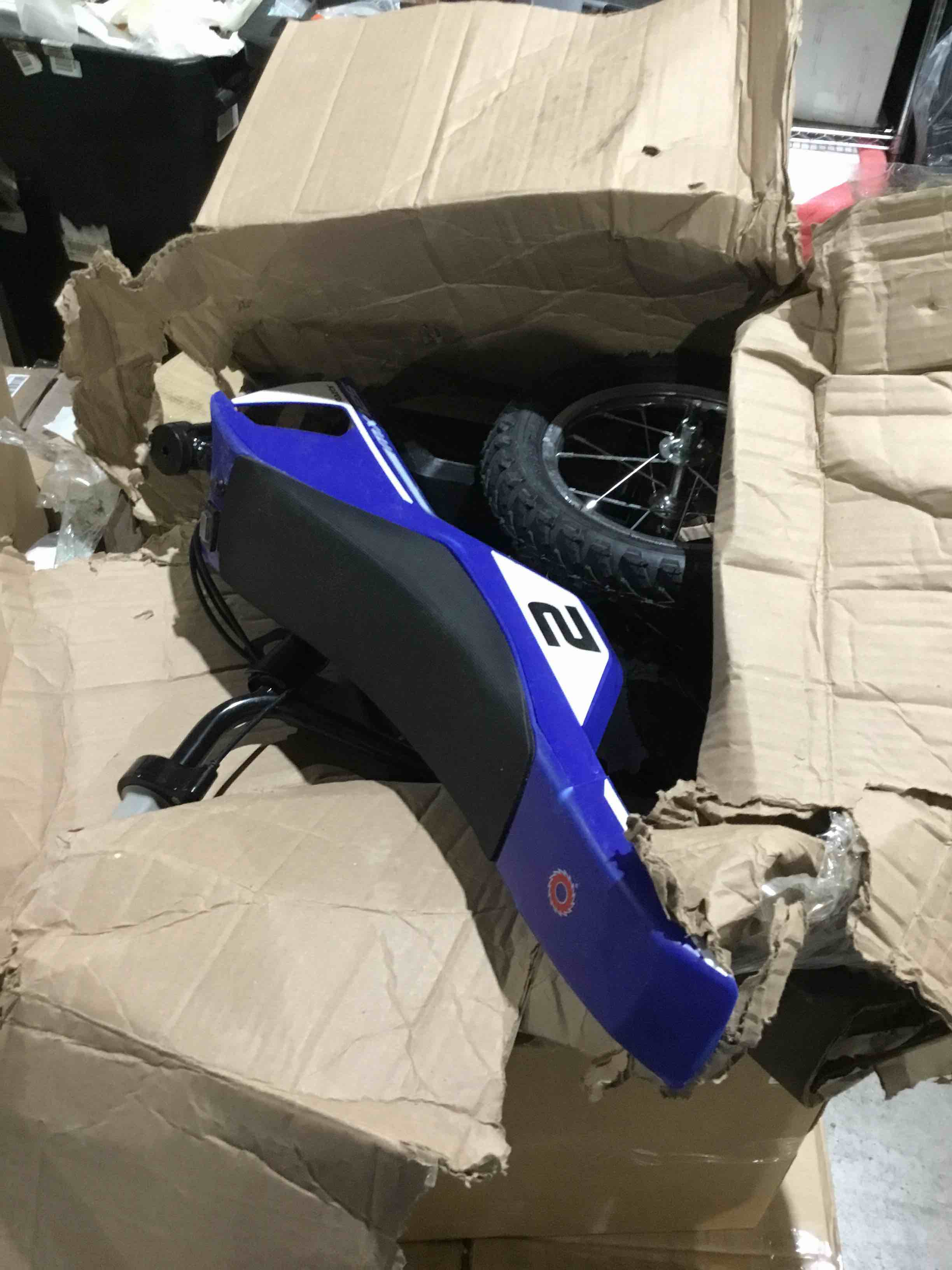 Condition photo showing As Is for razor mx125 dirt rocket electric-powered bike with authentic motocross geometry, rear-wheel drive,100-watt, high-torque, chain-driven motor, for kids 7+, blue