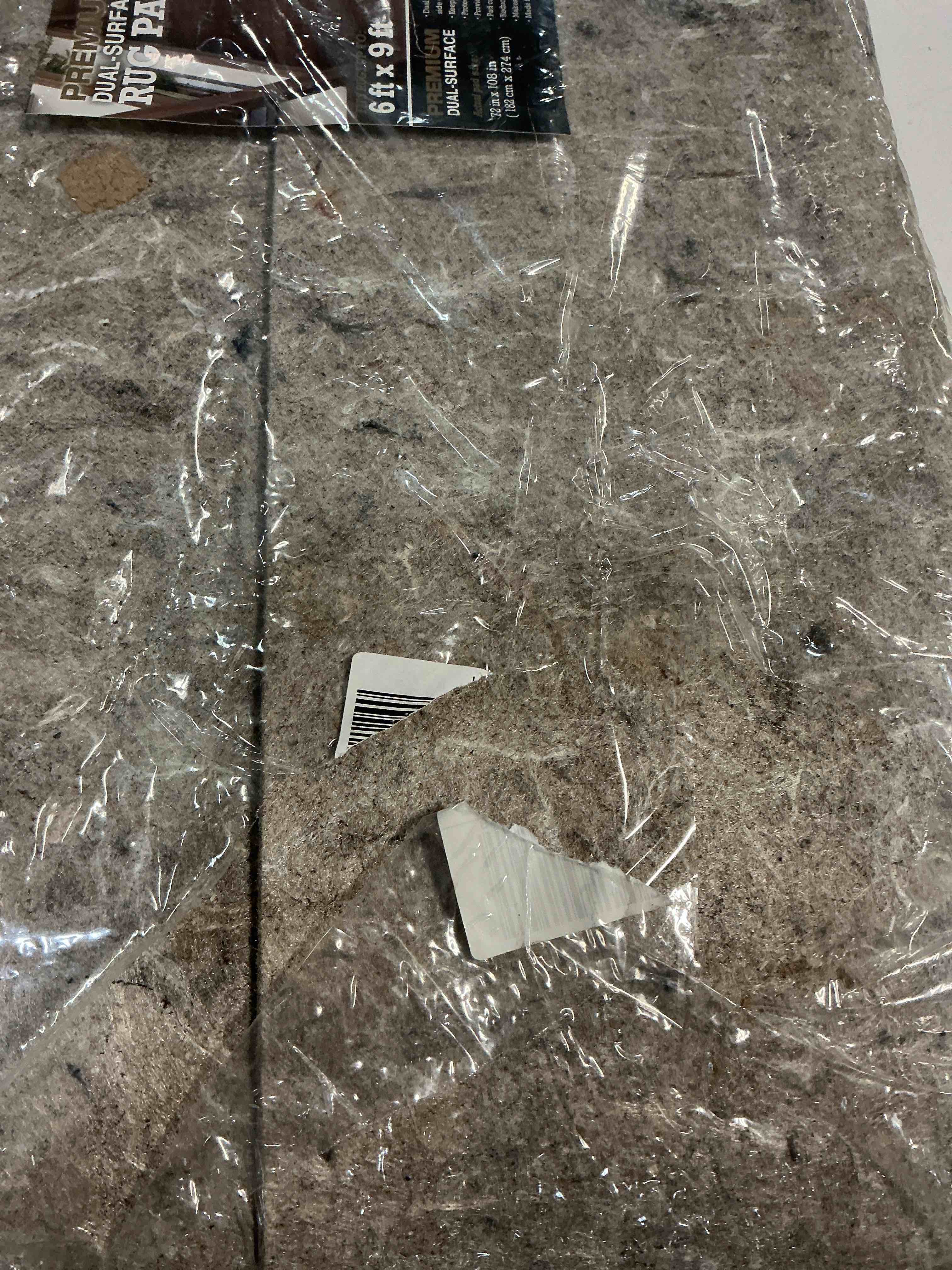 Condition photo showing New/Like New for mohawk home premium dual-surface rug pad in a 6 ft. x 9 ft.