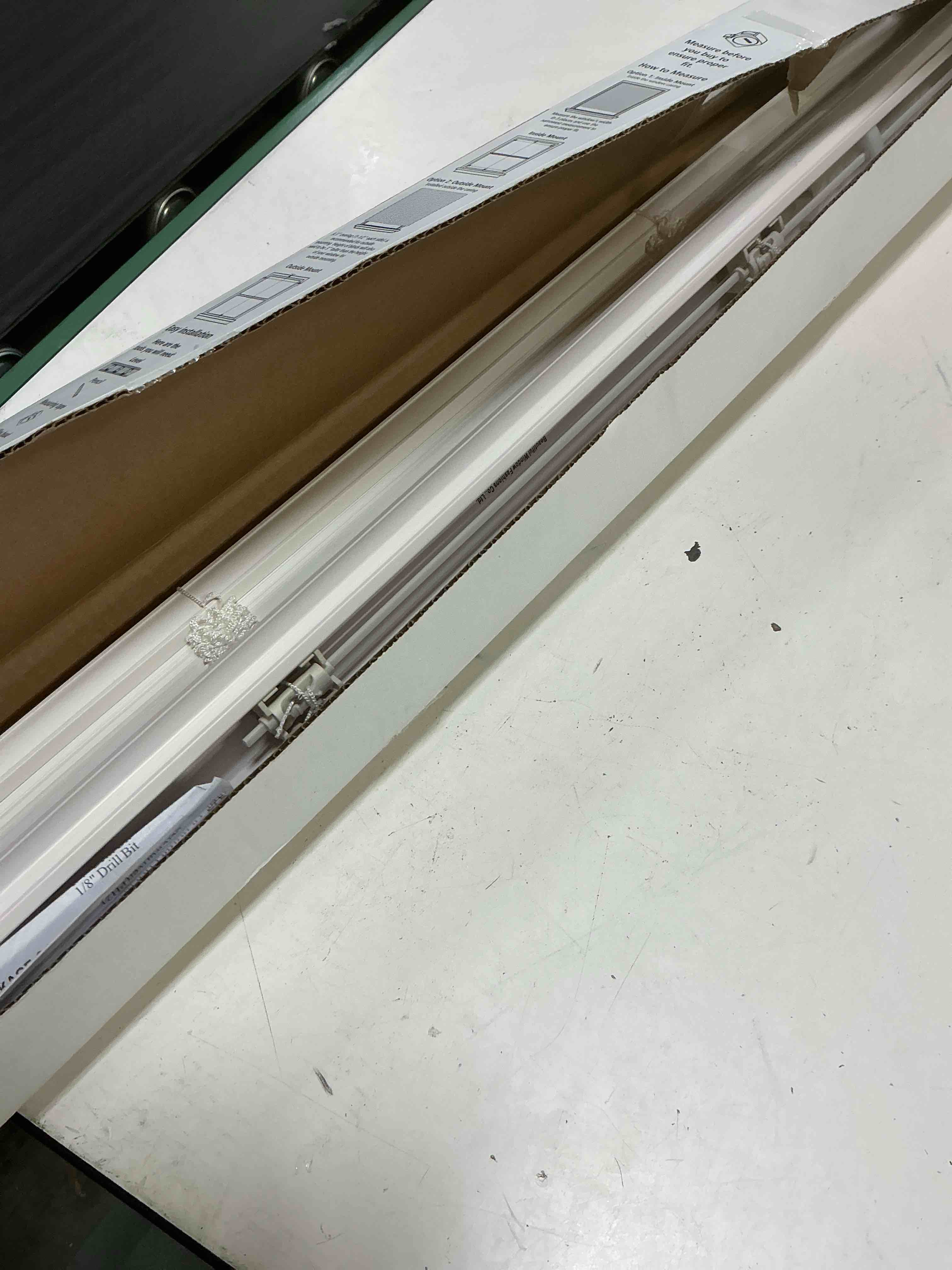 Condition photo showing As Is for mainstays 1 inch cordless vinyl light filtering mini blinds  white  35 x 64 inches