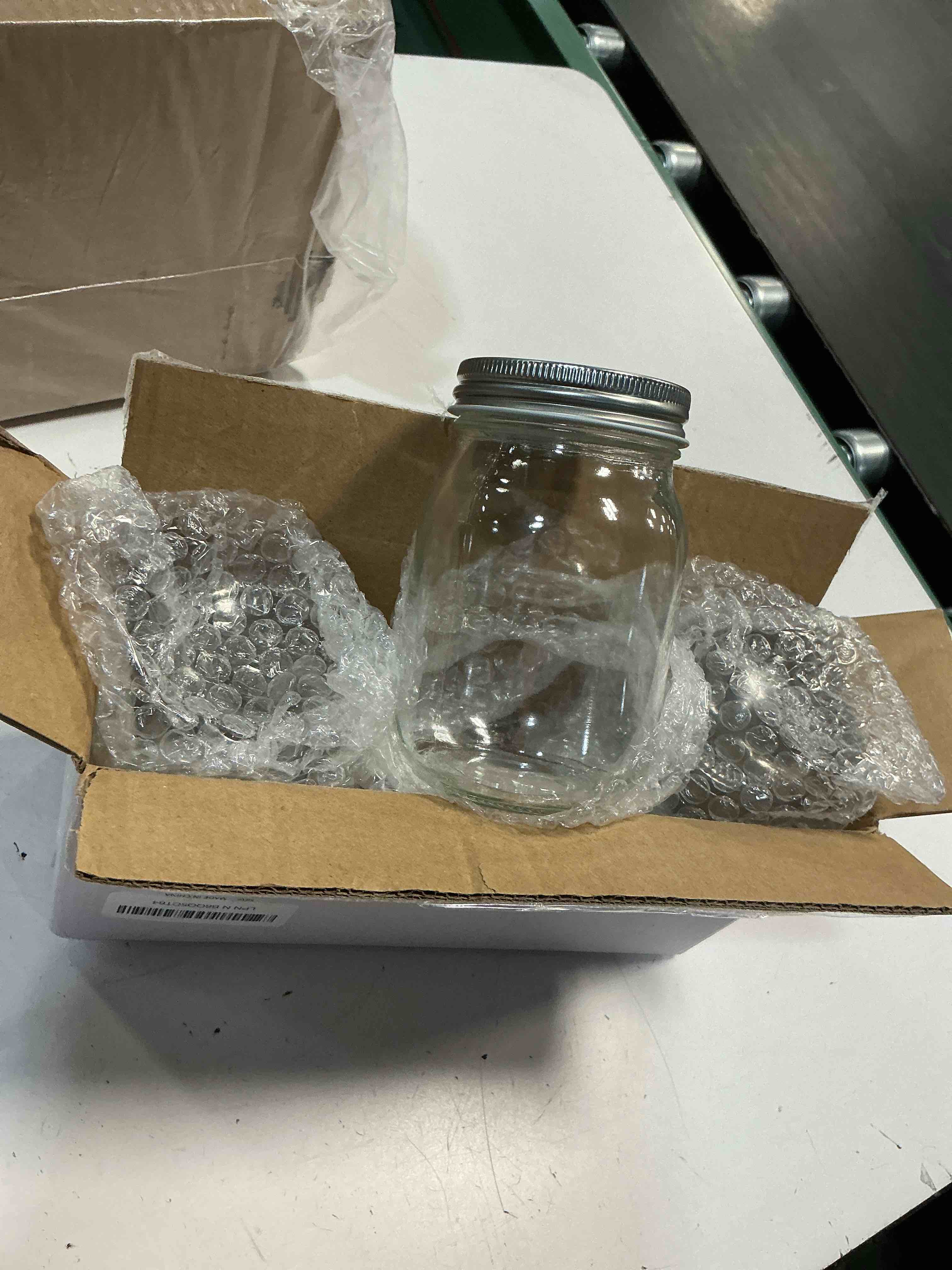 Condition photo showing New/Like New for glass mason jars, 3 pack 16oz clear glass regular mouth canning jars with lids for sealing, ideal for food storage, snacks, candies, jam, honey, wedding favors, shower favors, diy projects gmj11