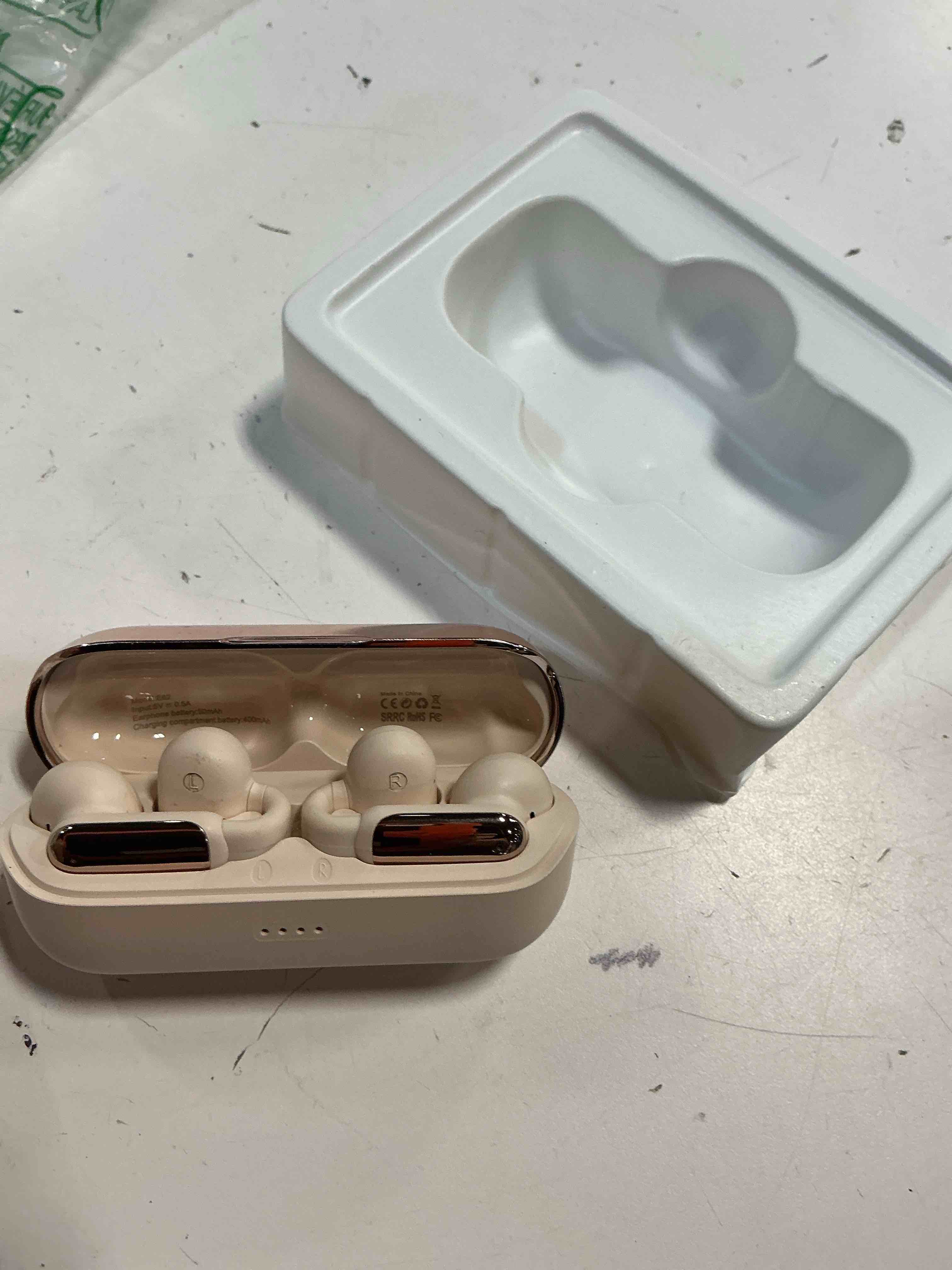 Condition photo showing As Is for ai translation earbuds real time, 3-in-1 translator clip on earbuds,160+ languages & accents, open ear headphones,ows bluetooth sport earphones with charging case, free app fit ios & android (pink) pink-ai-headphone pink