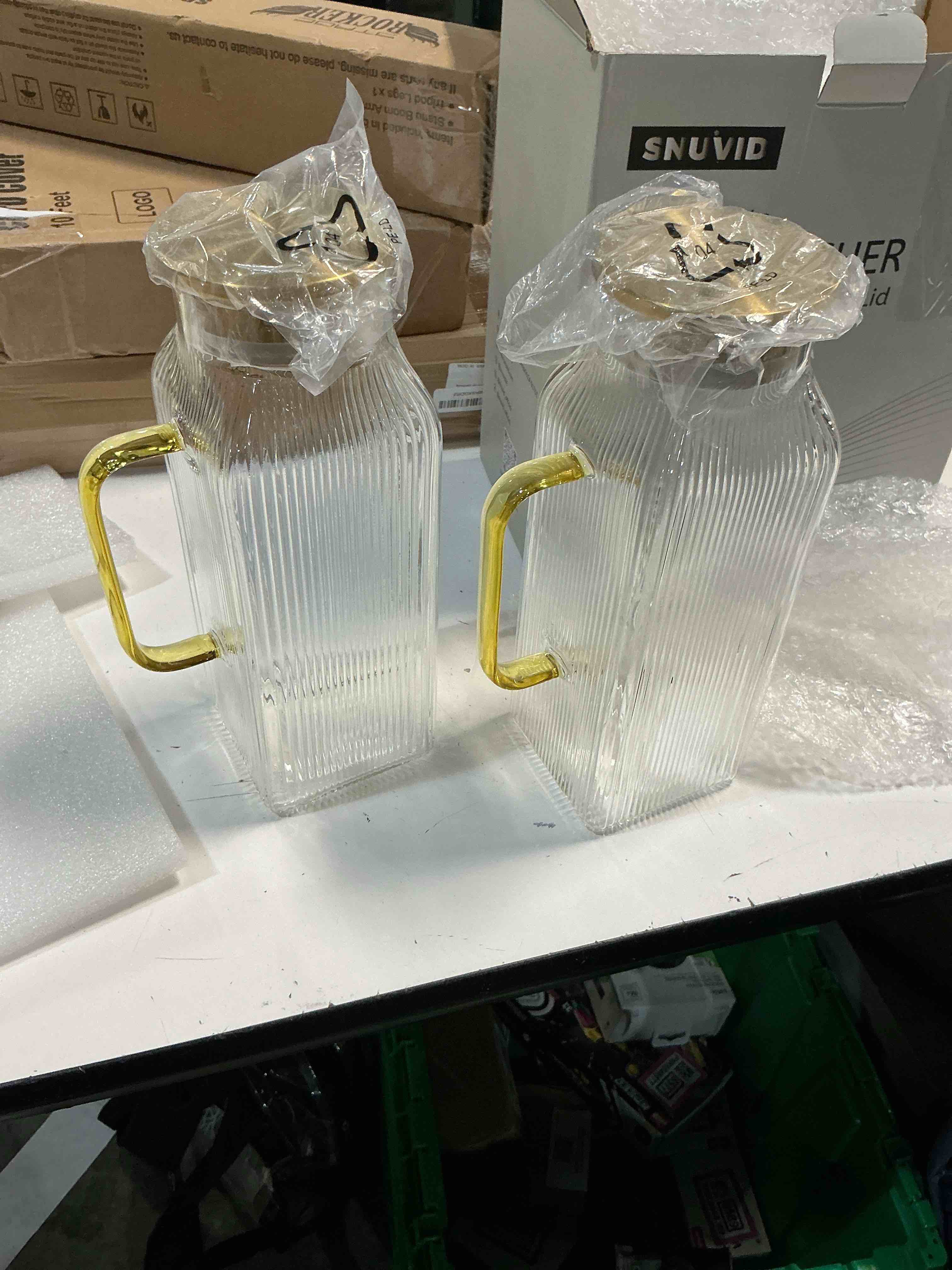 Condition photo showing New/Like New for 2 pack 2 liter/68 oz square glass pitcher with lid, classic stripes water pitchers with handle for fridge, large jug for iced tea, coffee, borosilicate glass carafe for hot/cold brew drink, gold gold 2
