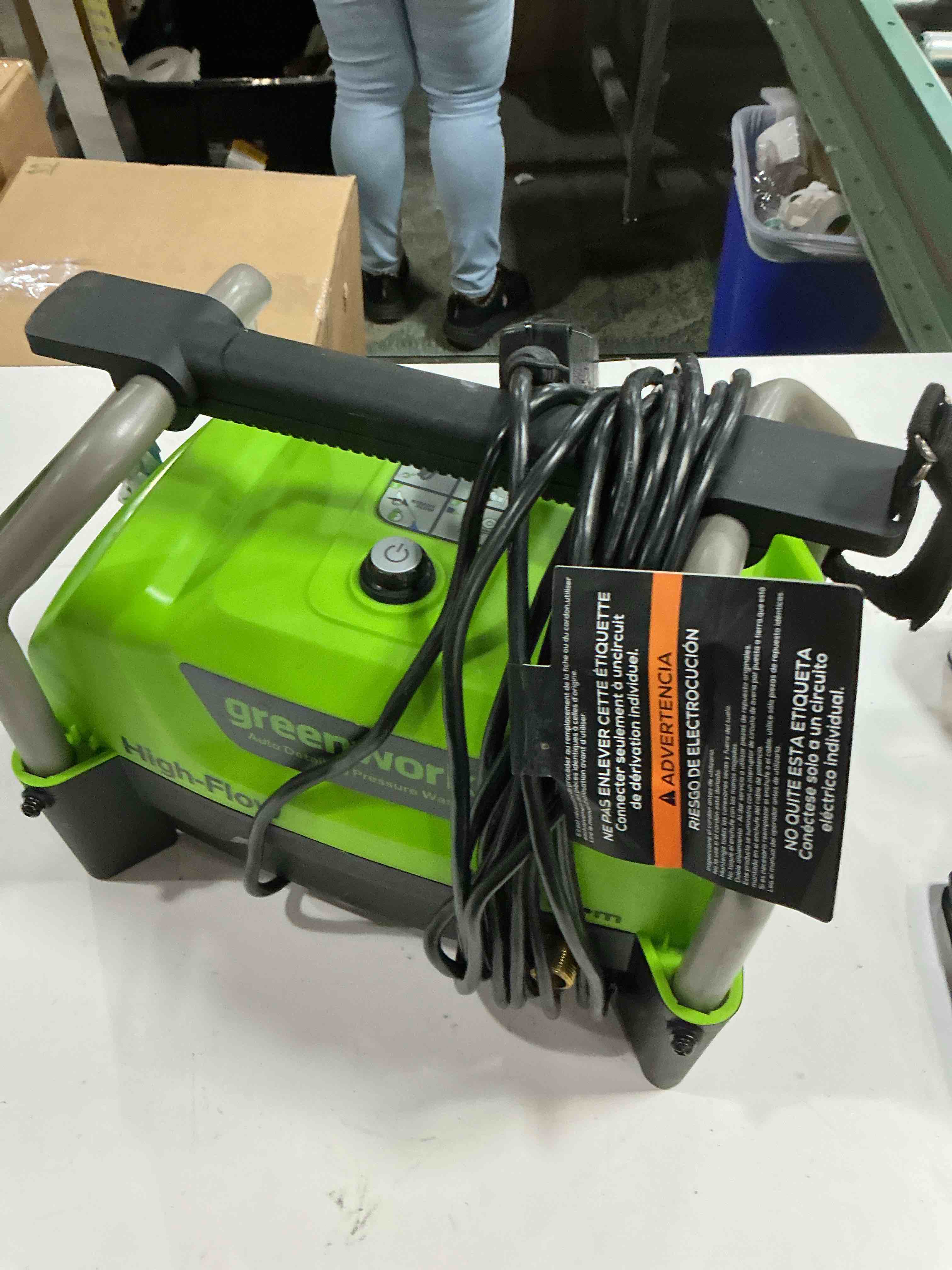 Condition photo showing As Is for greenworks high flow automotive 1200-psi 1.8-gpm cold water electric pressure washer with 3 spray tips (missing parts)