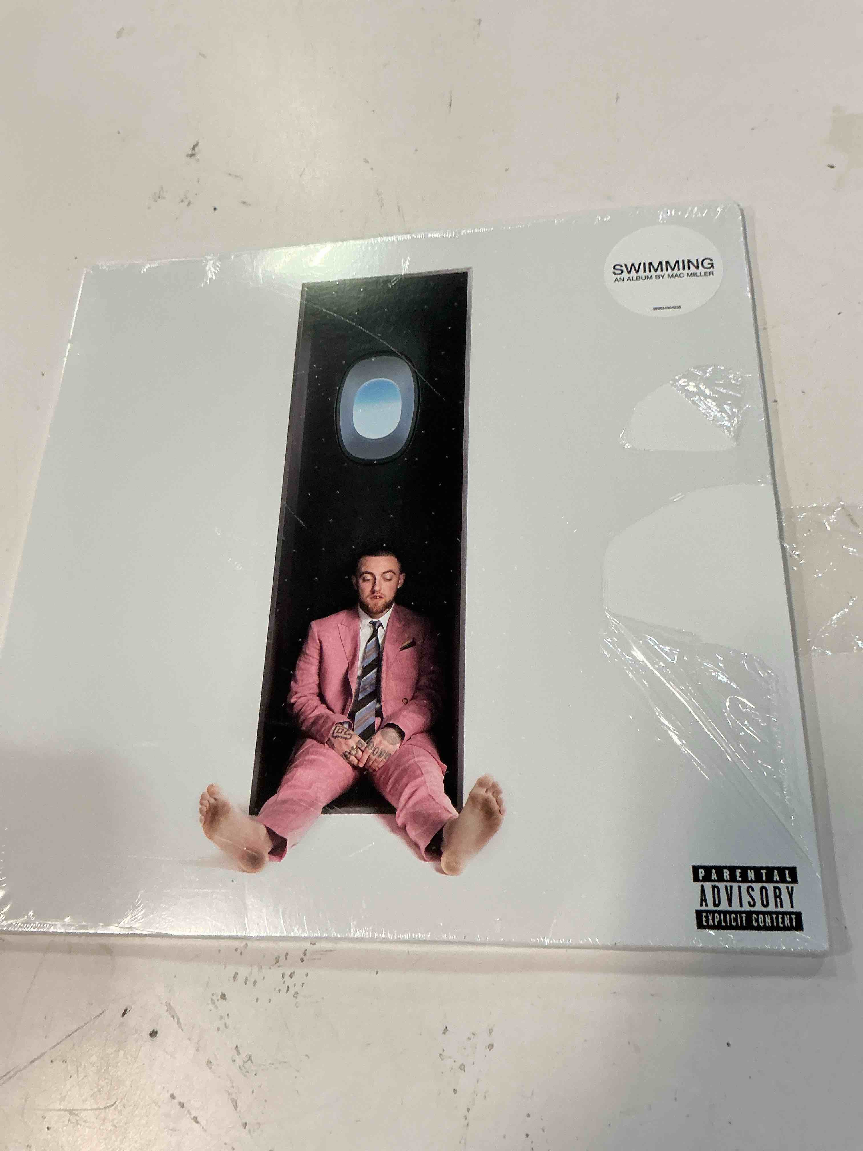 Condition photo showing New/Like New for swimming       explicit_lyrics