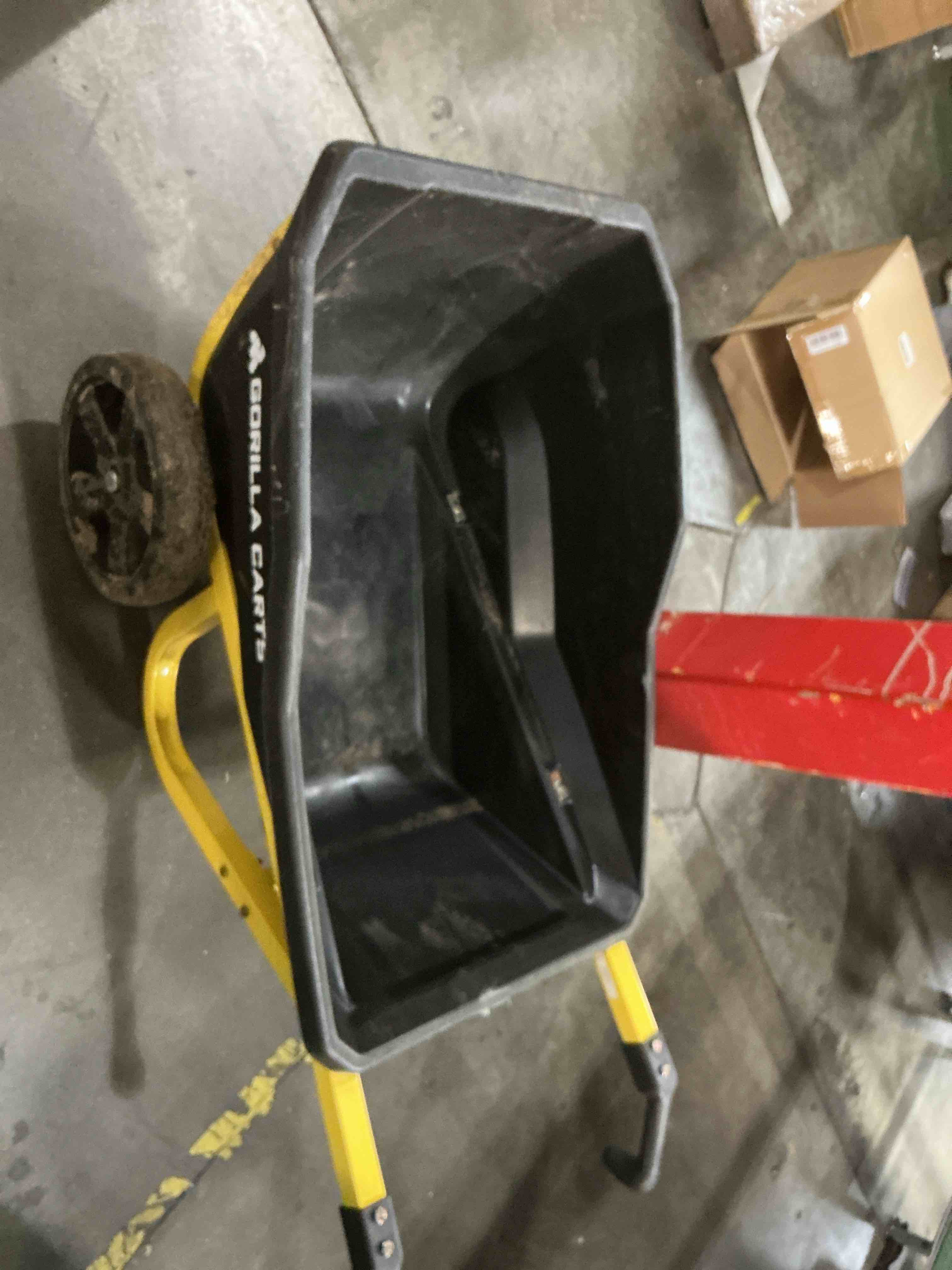 Condition photo showing As Is for 7 cu. ft. evolution poly garden cart, impact resistant poly tub, 12 in. no-flat tires, stable and easy to use design