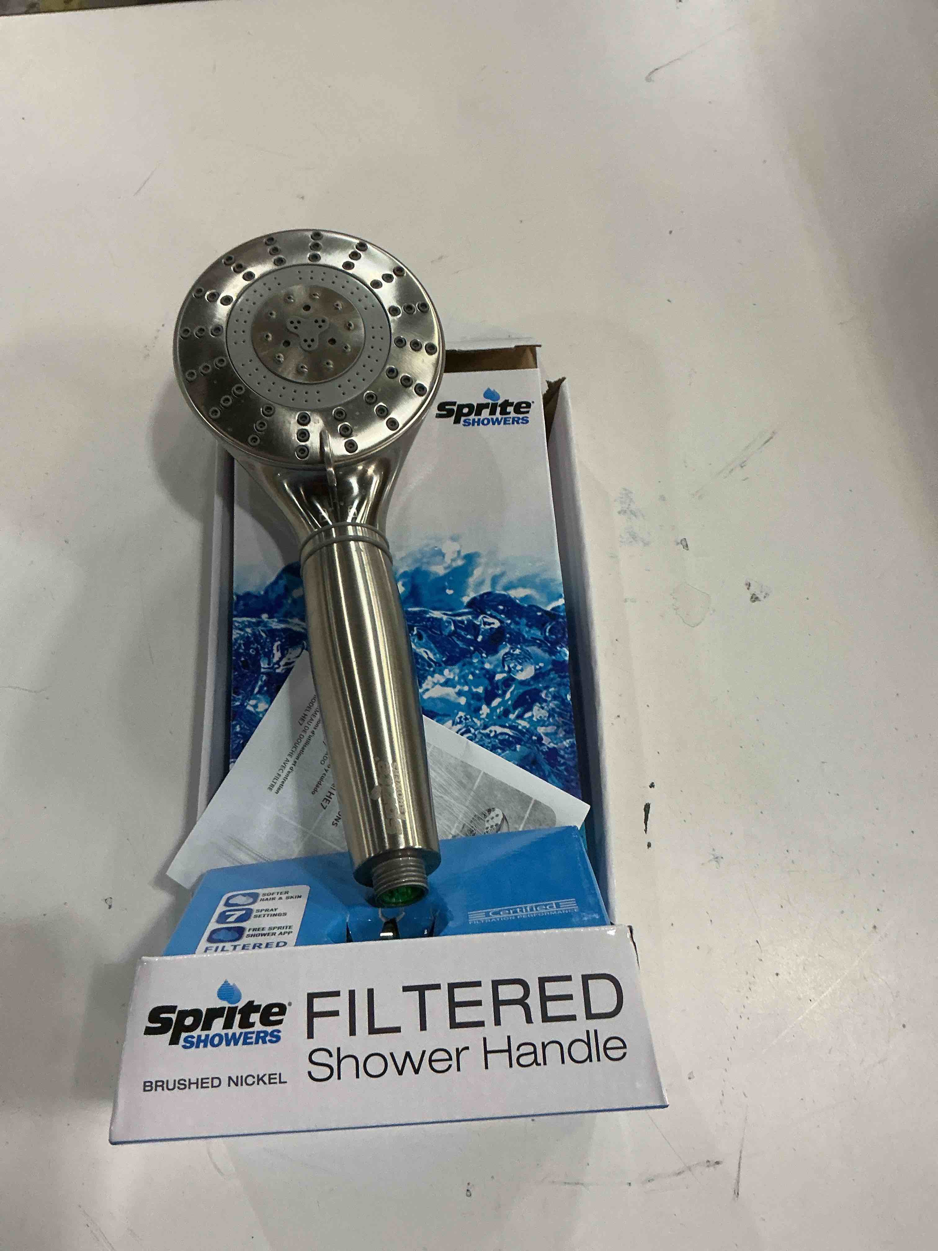 Condition photo showing As Is for sprite pure spray 7 -spray brushed nickel 5-in round rain filtered high pressure handheld shower head 2.5 gpm item #6034593 |