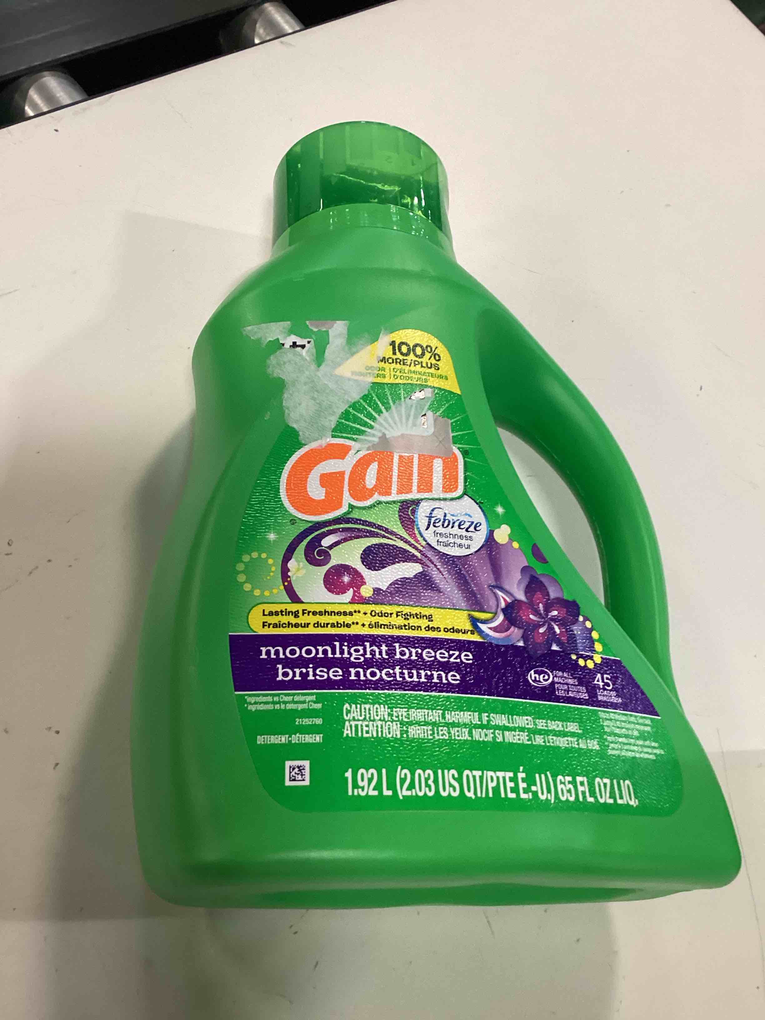 Condition photo showing New/Like New for gain, laundry detergent moonlight breeze + aroma boost, 65 fl oz