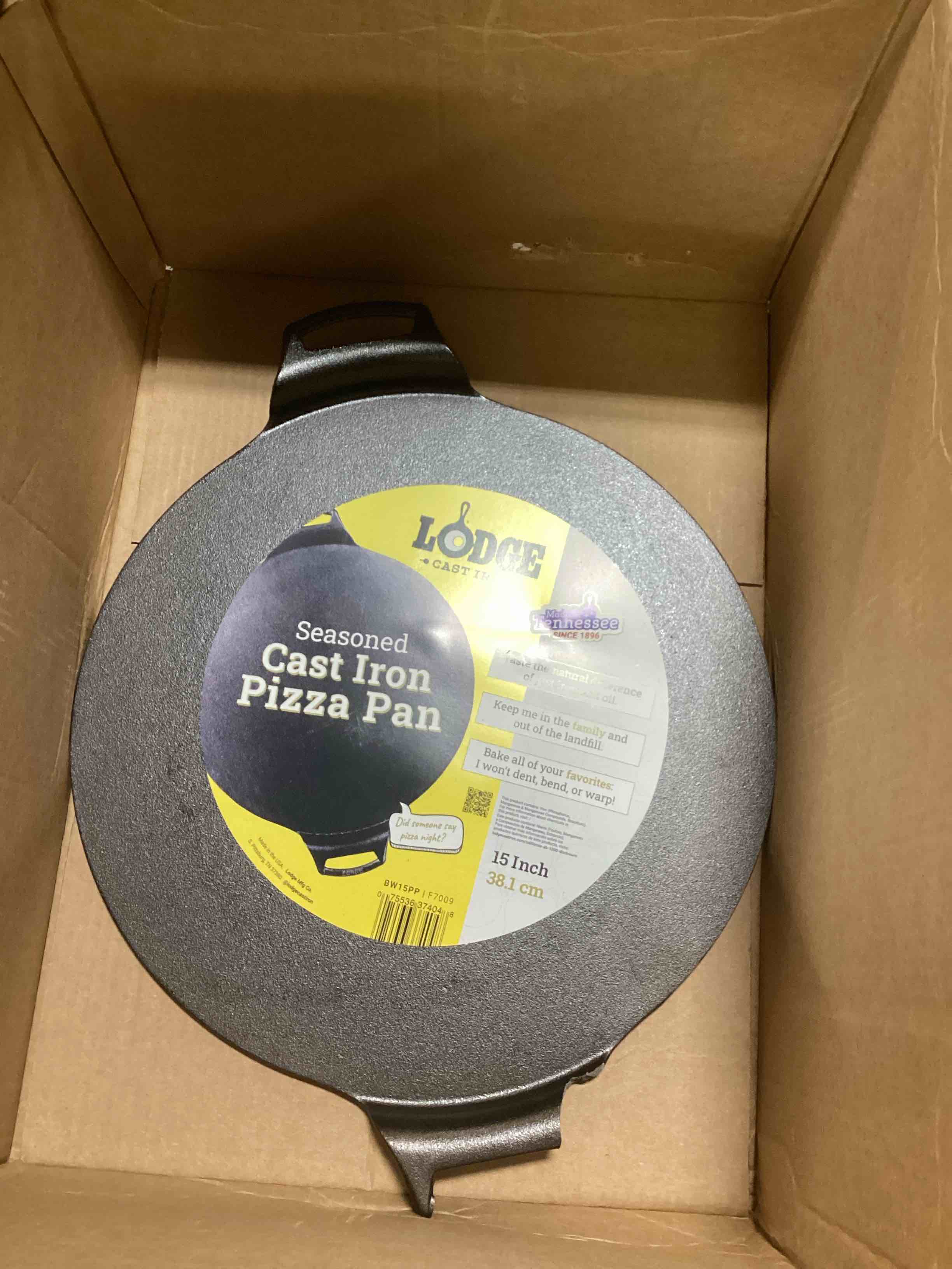 Condition photo showing As Is for lodge seasoned cast iron pizza pan 15 inch - pre-seasoned, round pizza pan with dual assist handles - even heat distribution- pfas-free, non-toxic cookware - oven safe