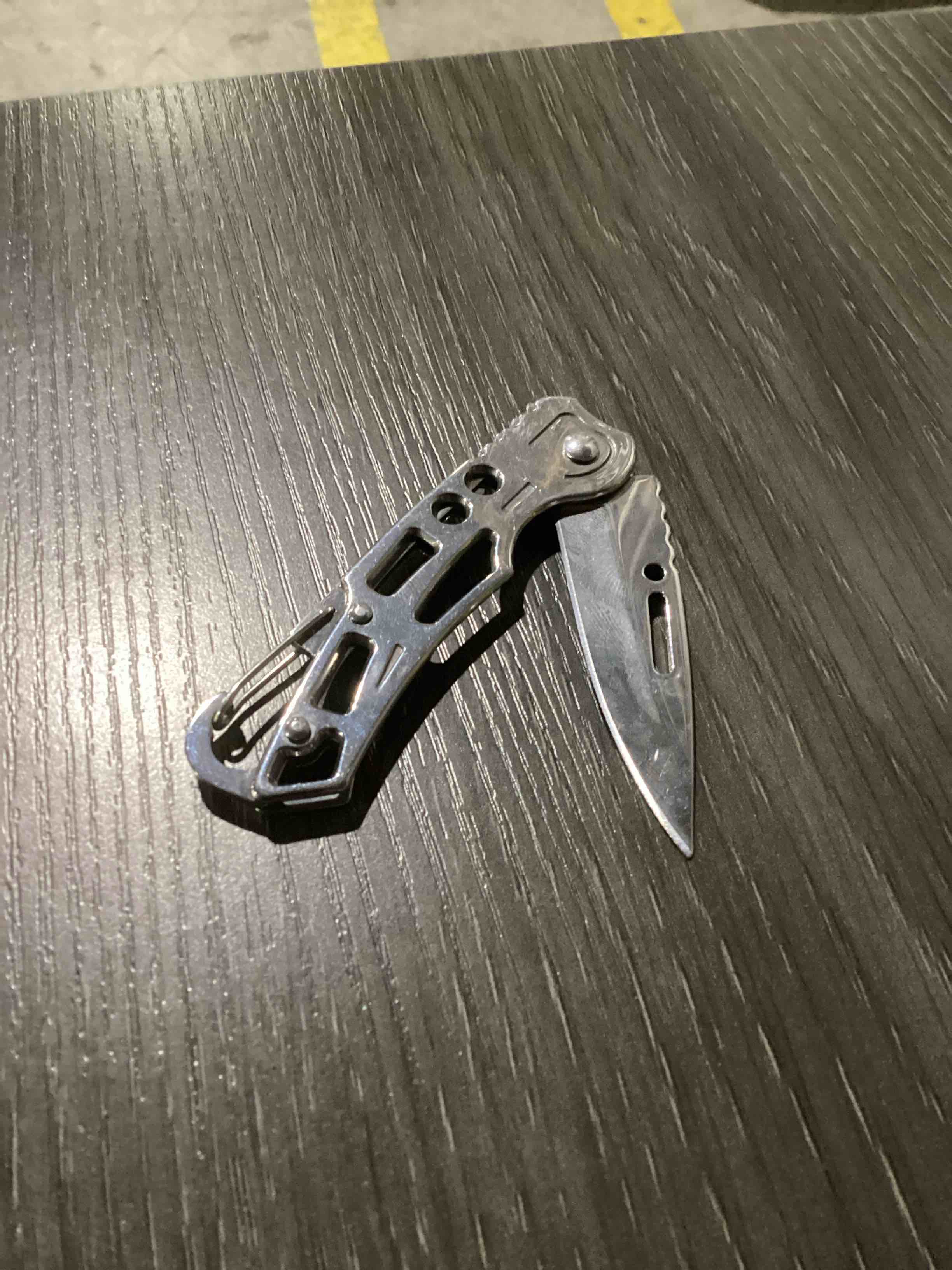 Condition photo showing As Is for silver compact, lightweight folding pocket knife featuring a sharp stainless steel blade, secure locking mechanism, and built-in carabiner clip—perfect for everyday carry, camping, hiking, and outdoor adventures.