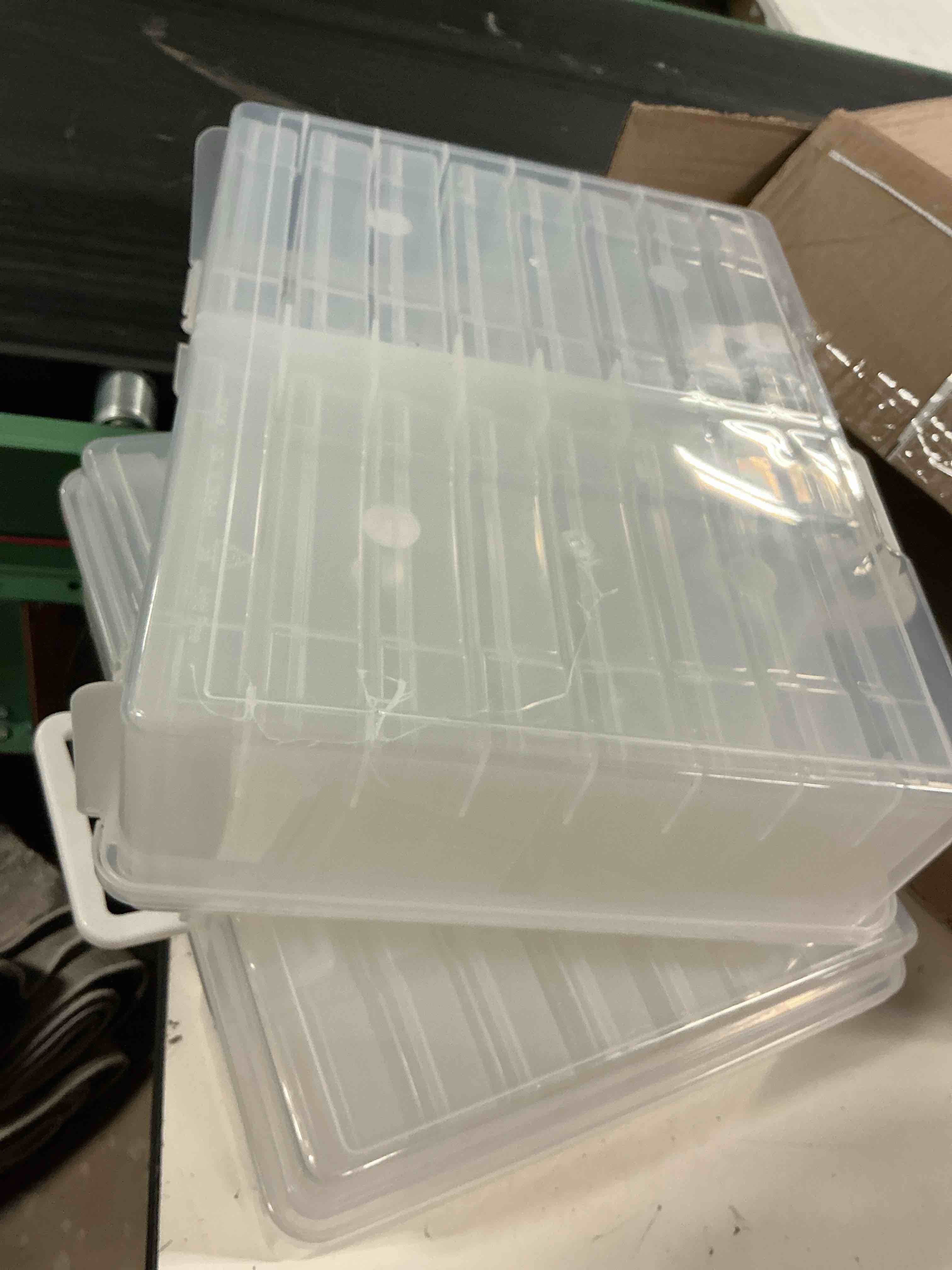 Condition photo showing As Is for novelinks transparent 4" x 6" photo organizers and photo storage box with handle, 16 inner photo cases, portable picture organizers & photo storage containers (clear 2pack) clear clear 2pack