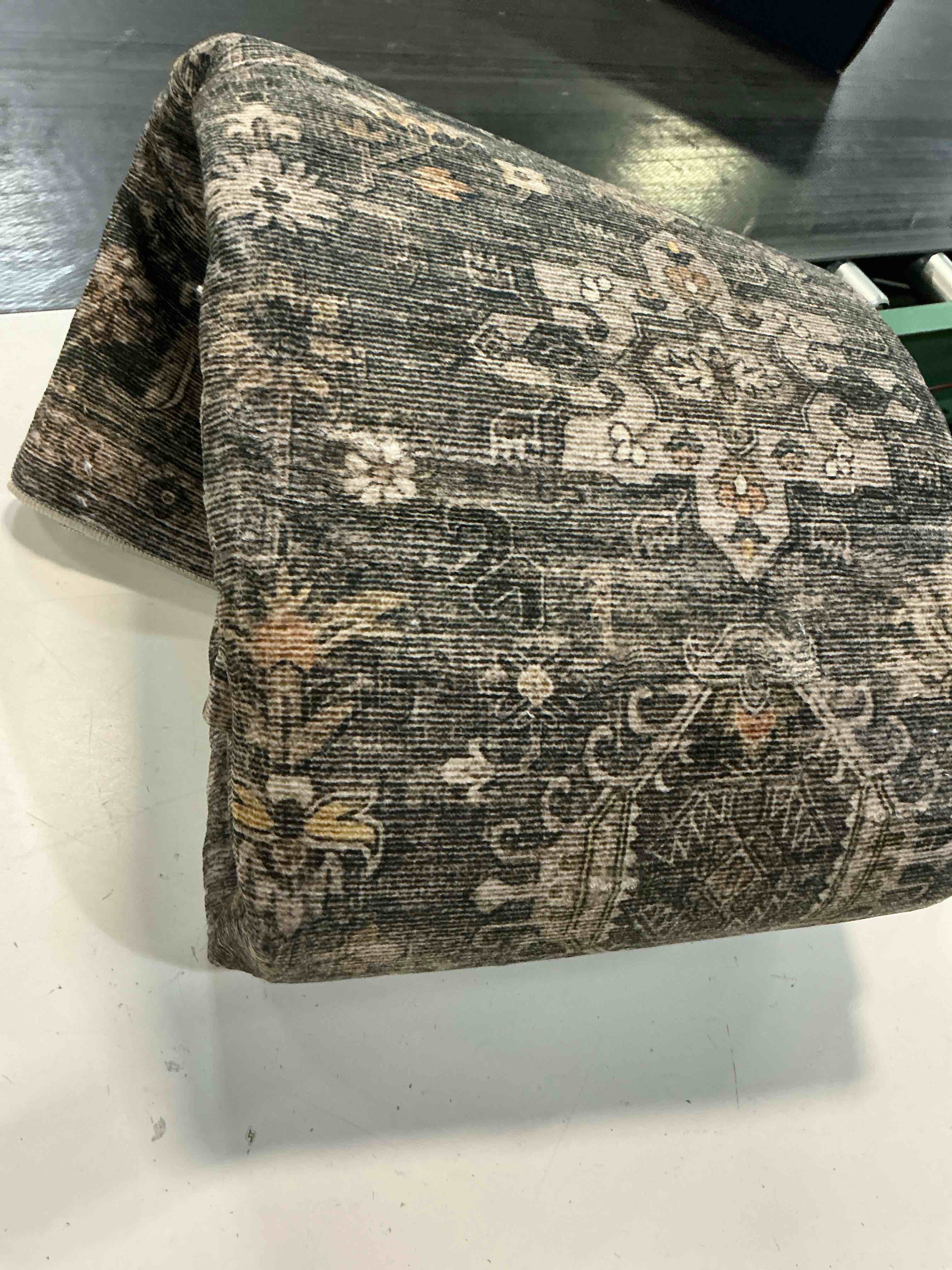 Condition photo showing Good Condition for 5x7 washable area rug for living room, boho vintage floral non slip | moss vintage soft faux wool rug for dining room bedroom, stain resistant pet-friendly low pile non-shedding rug