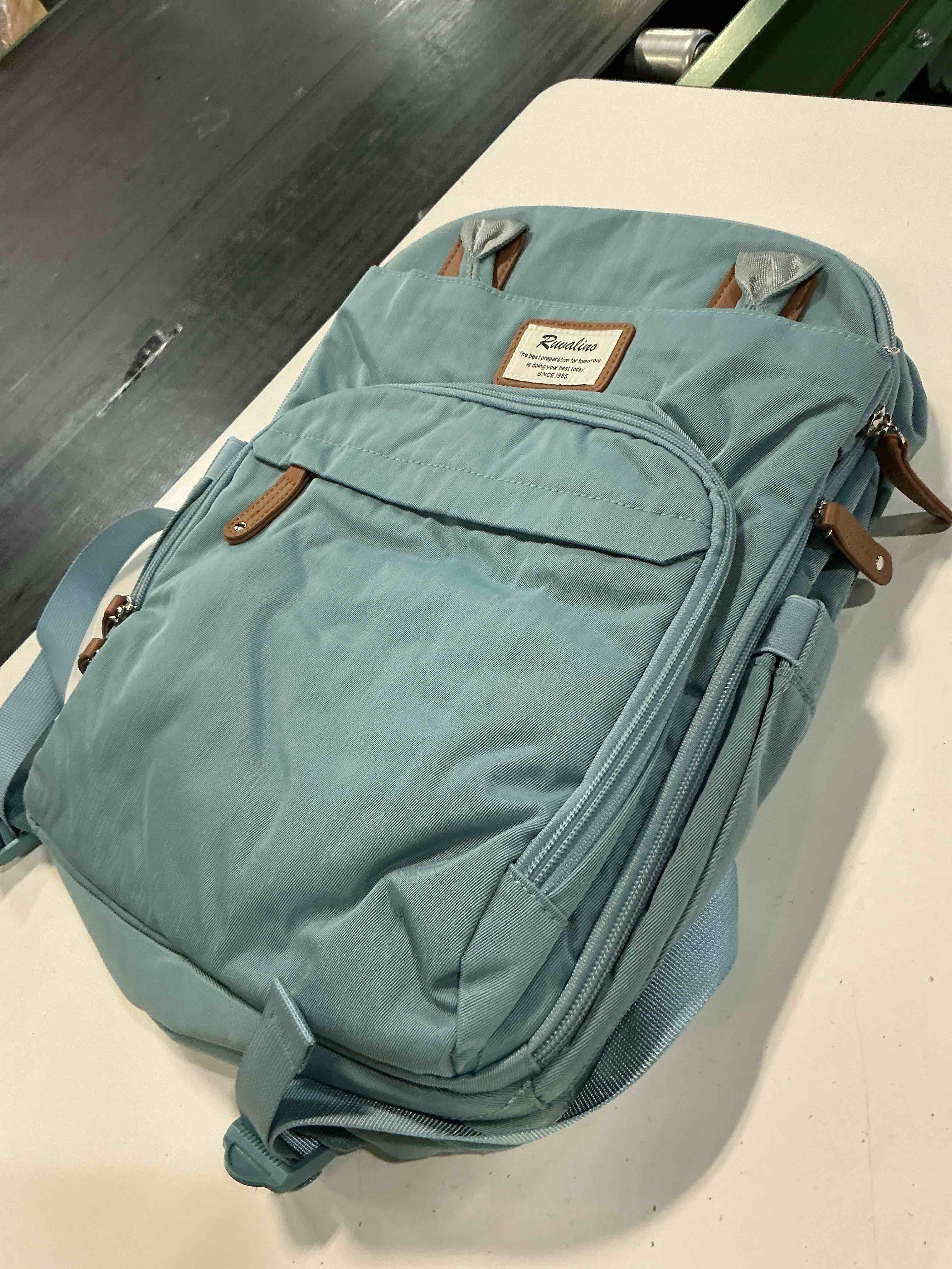 Condition photo showing Good Condition for ruvalino large diaper bag backpack, multifunction baby changing travel bag with insulated pockets, waterproof backpack for moms & dads - sky blue