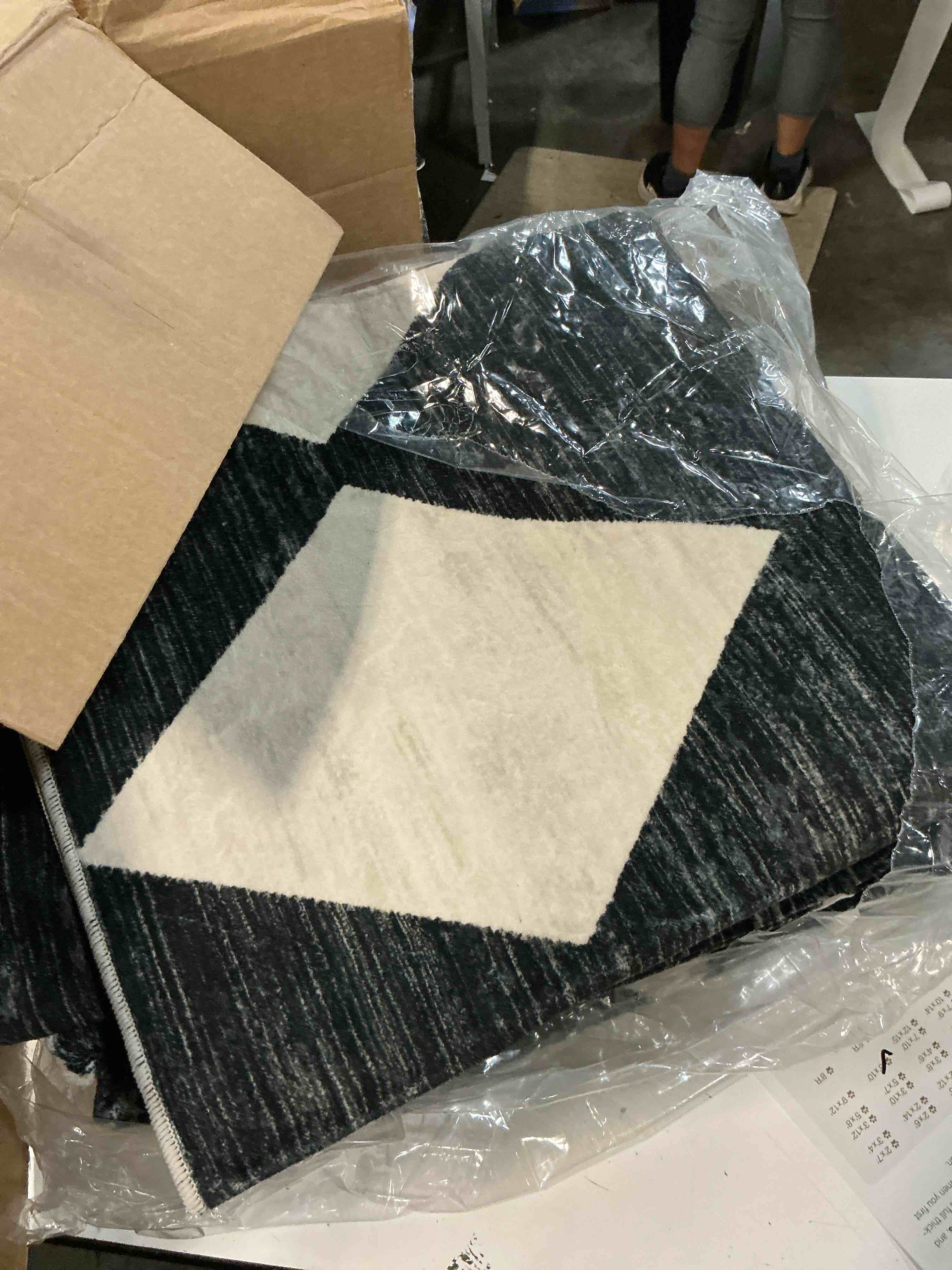 Condition photo showing Good Condition for black 8x10 washable area rug living room non slip checkered carpet | soft, low pile, easy clean, diamond pattern, for bedroom, office, nursery, dining room, kids room, modern indoor decor