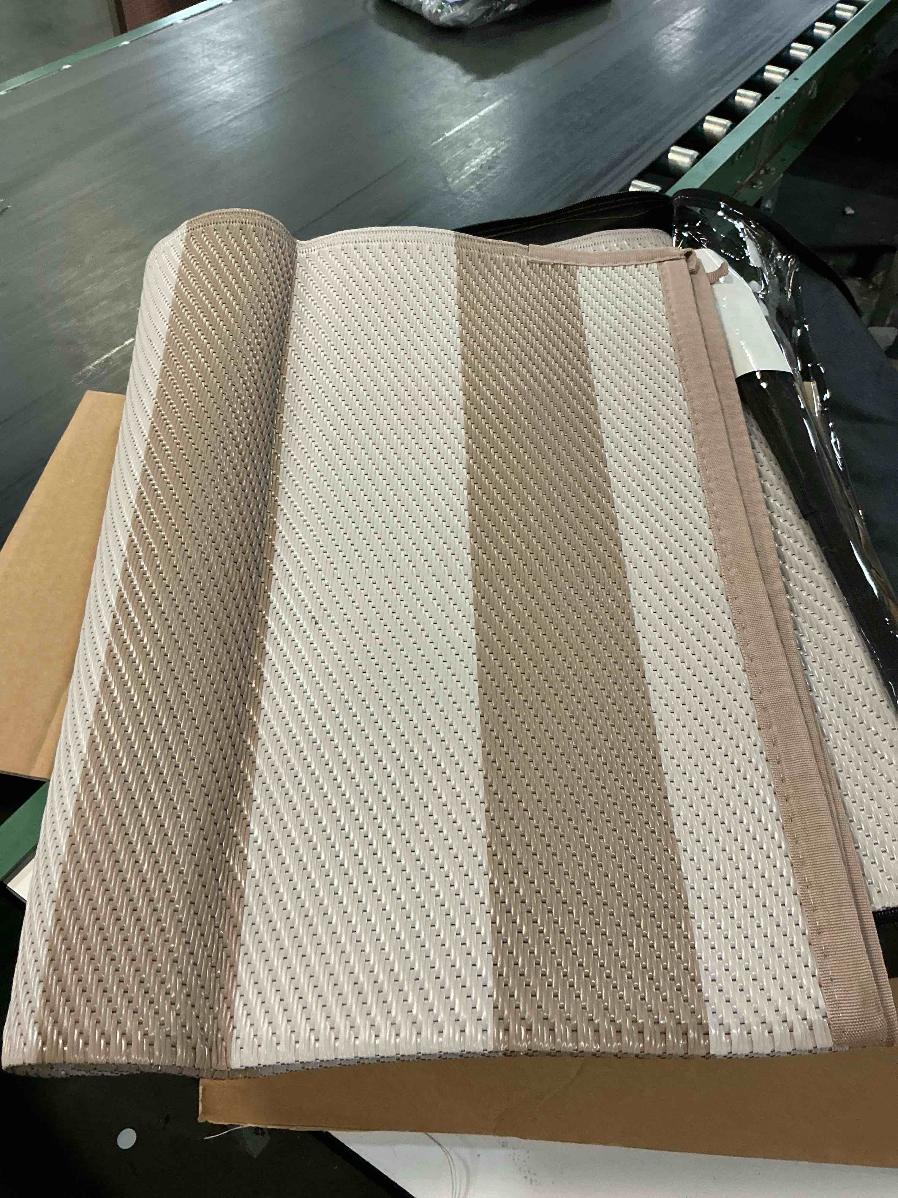 Condition photo showing Good Condition for 8x10 outdoor rug beige striped | waterproof, reversible, large patio rug for deck, porch, camping, rv, plastic straw outdoor carpet