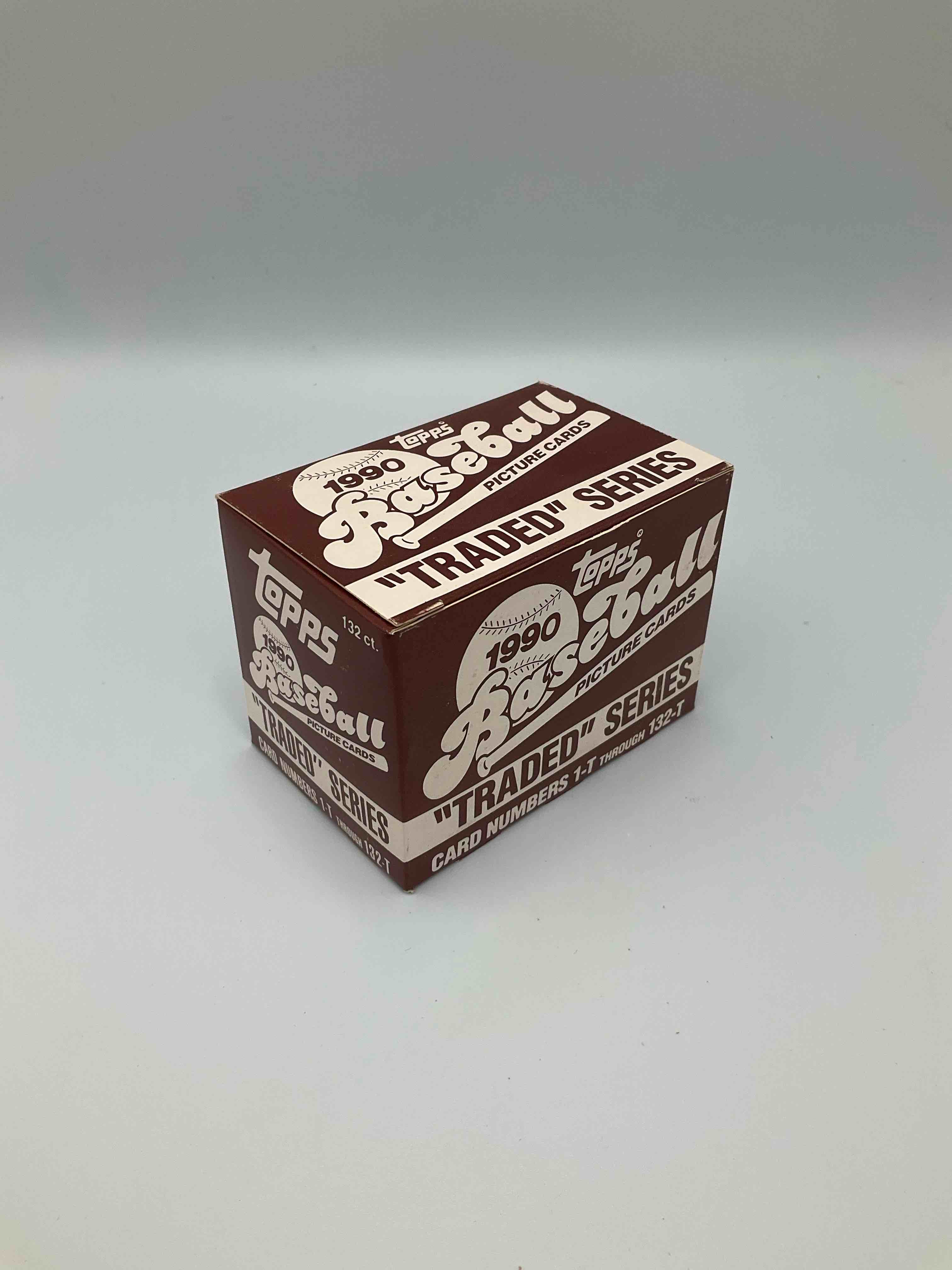 1990 Topps Baseball Card Complete Unopened Traded Series, Card Numbers 1-T Through 132-T. Set Is Unopened (These Sets Were Never Factory Sealed In Plastic From Manufacturer). Set Includes David Justice Traded Rookie. Great Sports Card Memorabilia!