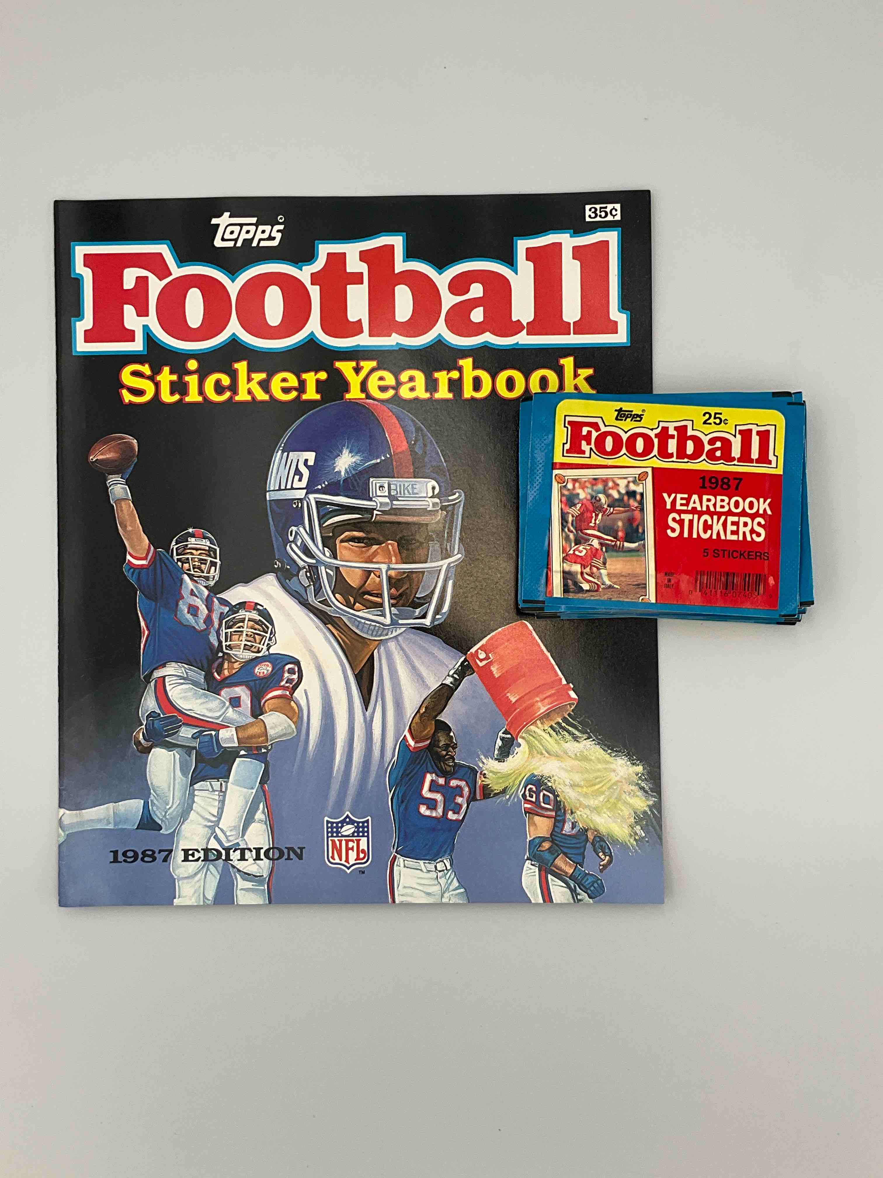 1987 Topps Football Sticker Yearbook Special! You'll See A Blue Moon Before You Ever See This Again! One Unused Topps 1987 Football Sticker Yearbook, & 20 Unopened Packs Of Matching 1987 Stickers To Use With Book (5 Stickers Per Pack, 100 Total Stickers). 21 Total Pieces In Lot. Both Sticker Yearbook & Sticker Packs Are Direct From Original Retail Dealer Box. Stickers Could Also Be Used To "Stick Anywhere." Here's Your Chance To Own Some Very Unique Football History & Incredible Sports Memorabilia... 1987 Is A Rare Football Year With Tons of Star Rookies Such As Reggie White, Herschel Walker & Jim Kelly. Super Rare!