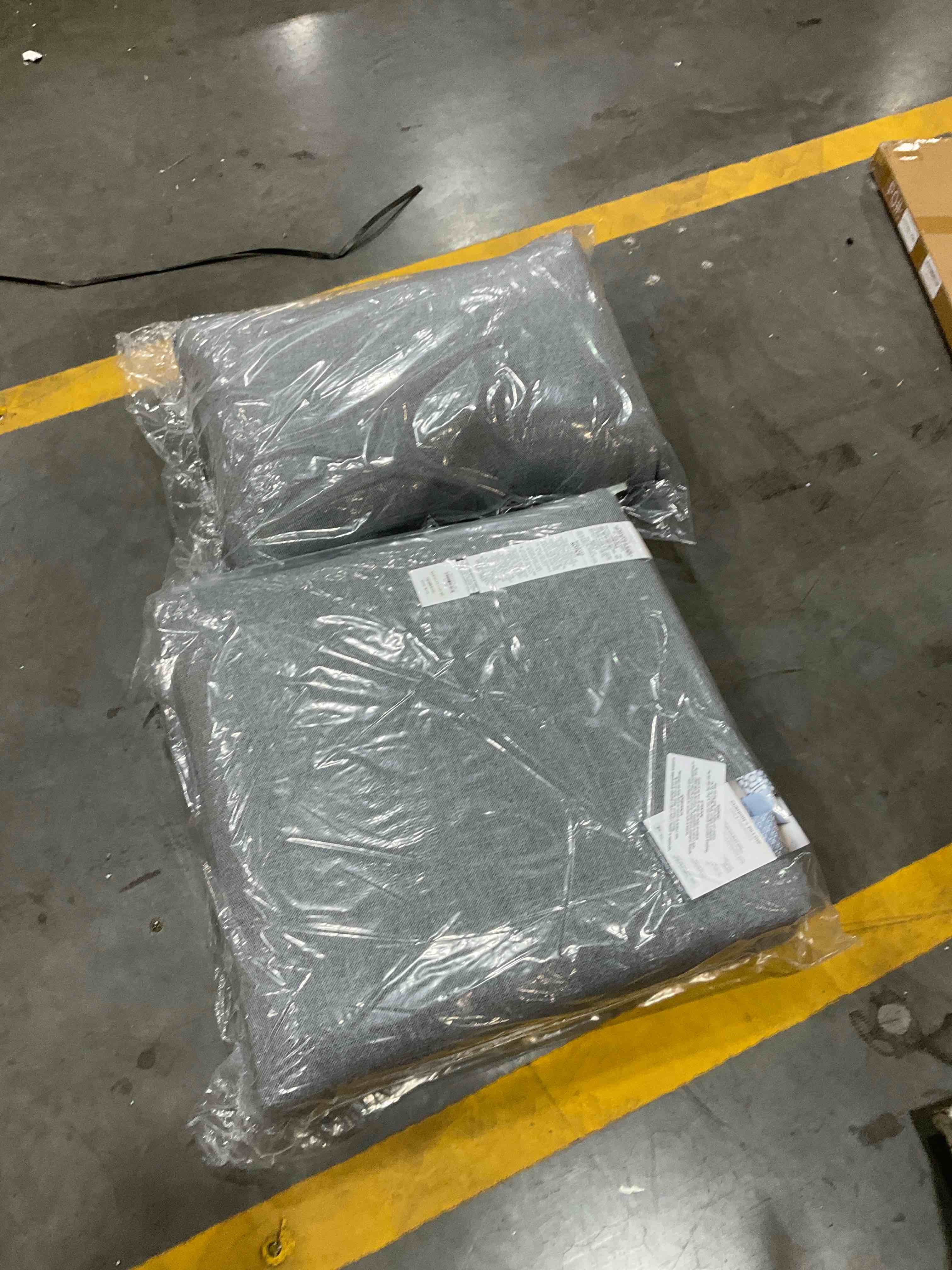 grey couch cushion and pillow