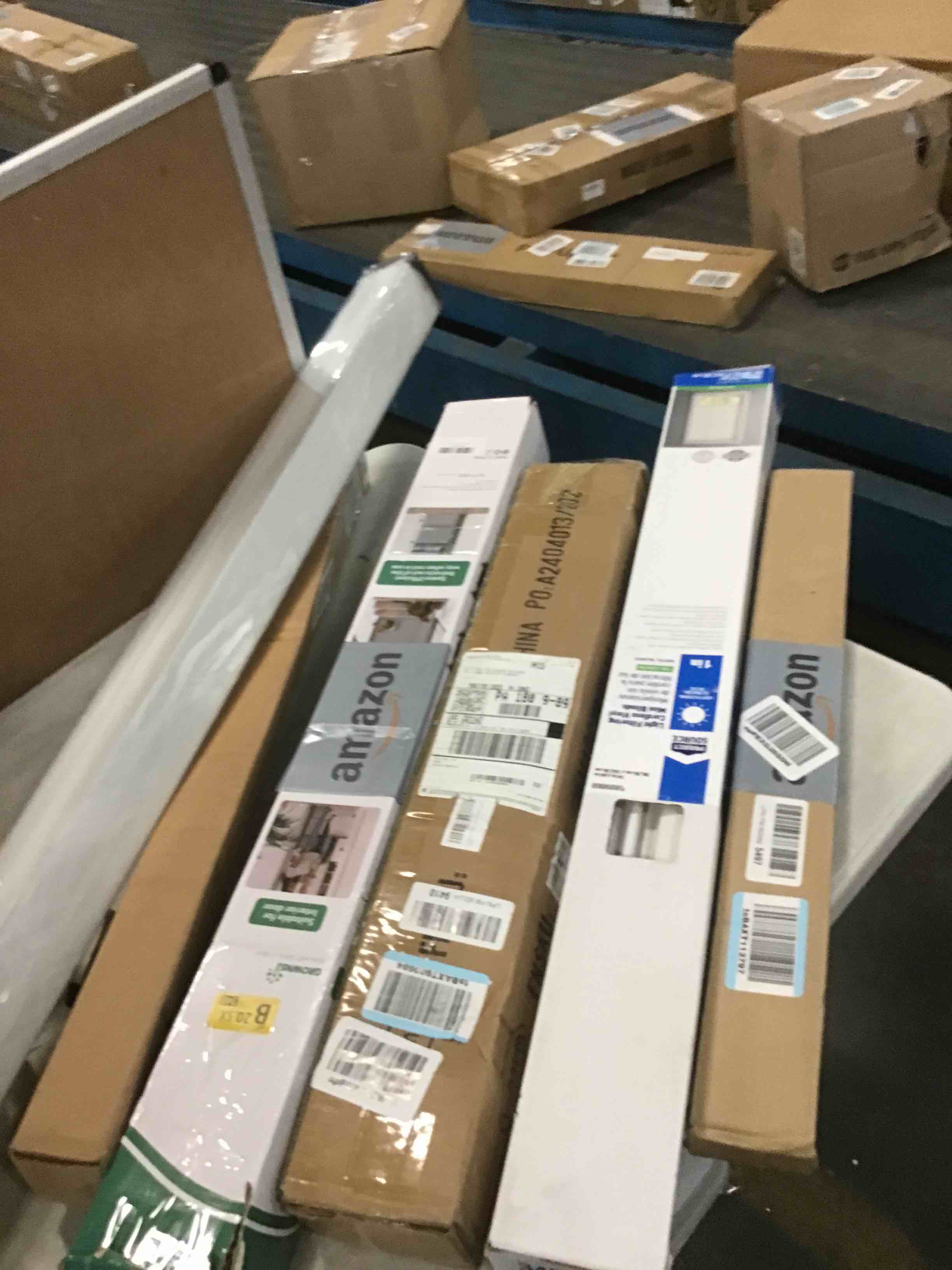 Assortment of Miscellaneous products (May Include cordless shade, curtain rods, retractable baby gate, Led universal linear lamp and more or other use)