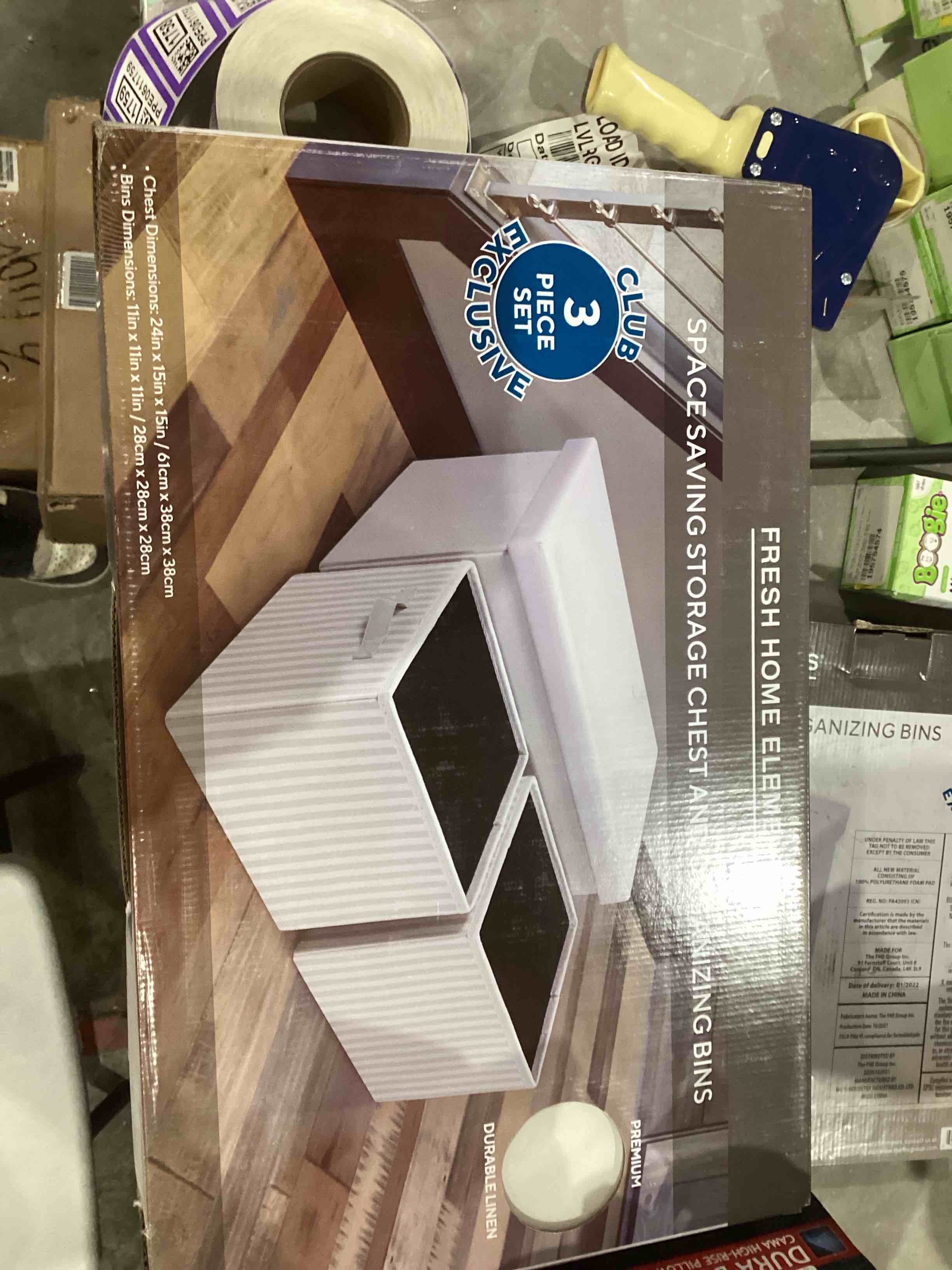 The product shown is a Fresh Home Elements 3-piece storage set. It is designed for space-saving storage and organization. The