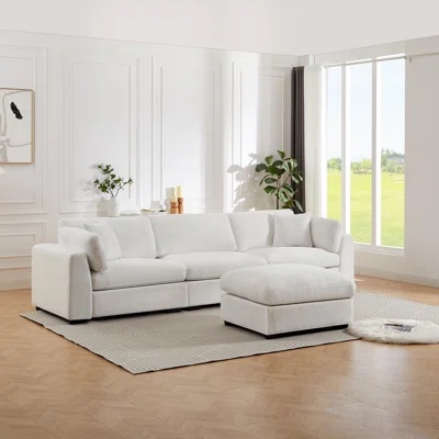 Aariketh 130.87”Wide Upholstered Loose Back Modular Sectional Sofa with Large Ottoman