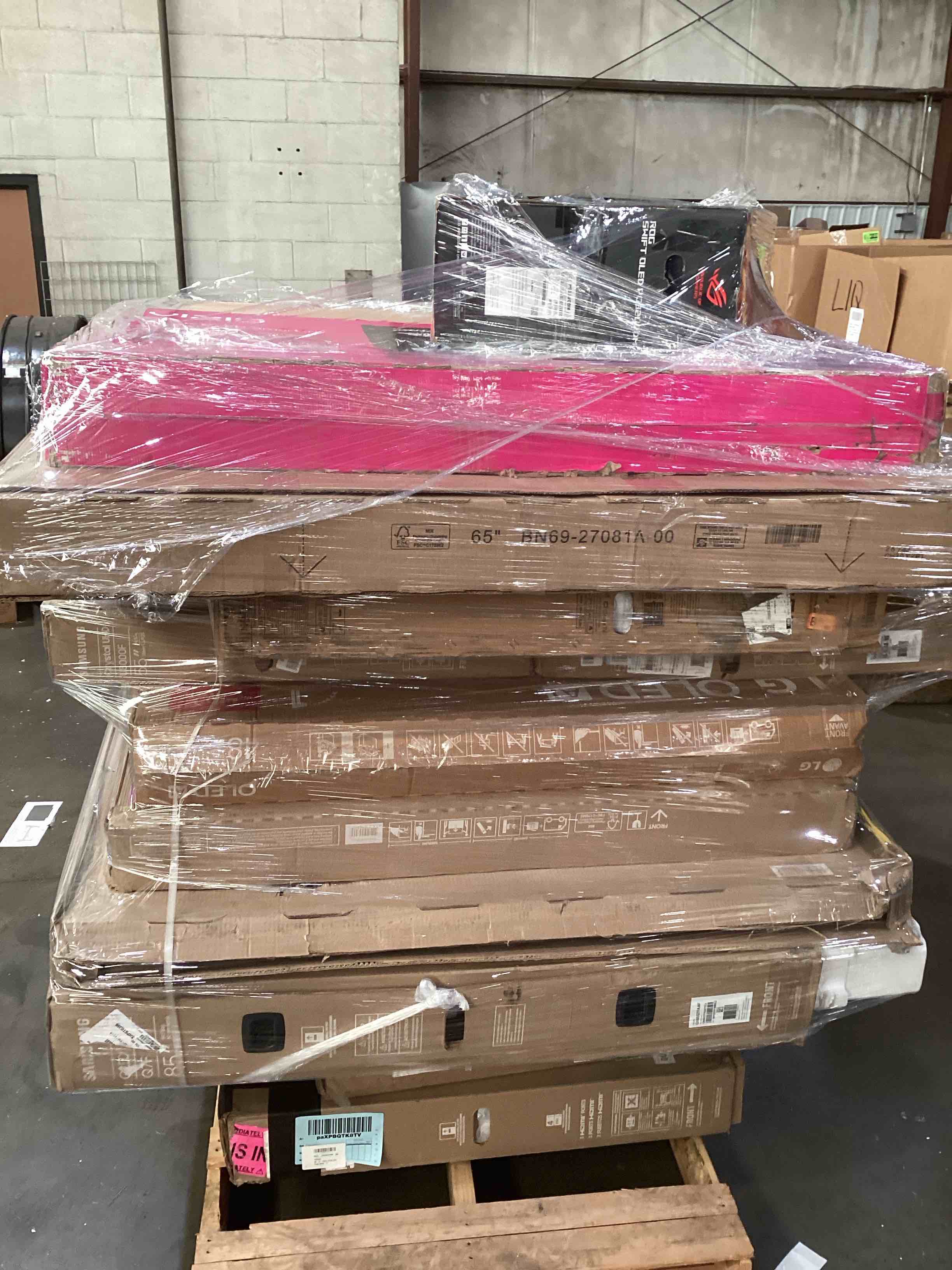 pallet of broken tvs 