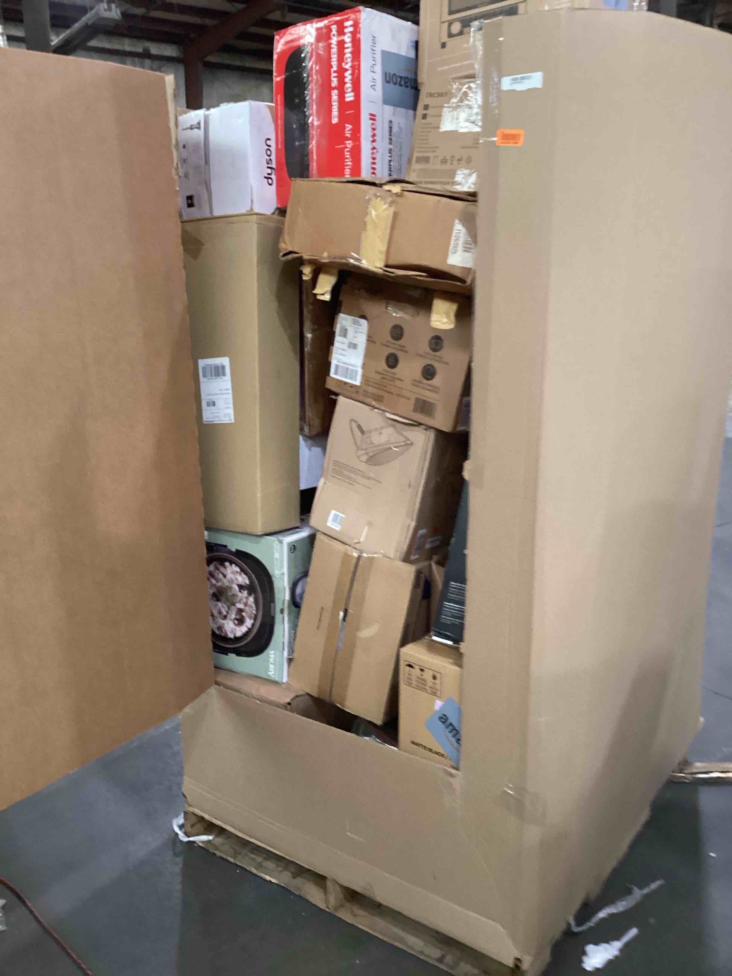 pallet of small miscellaneous appliances and appliance parts