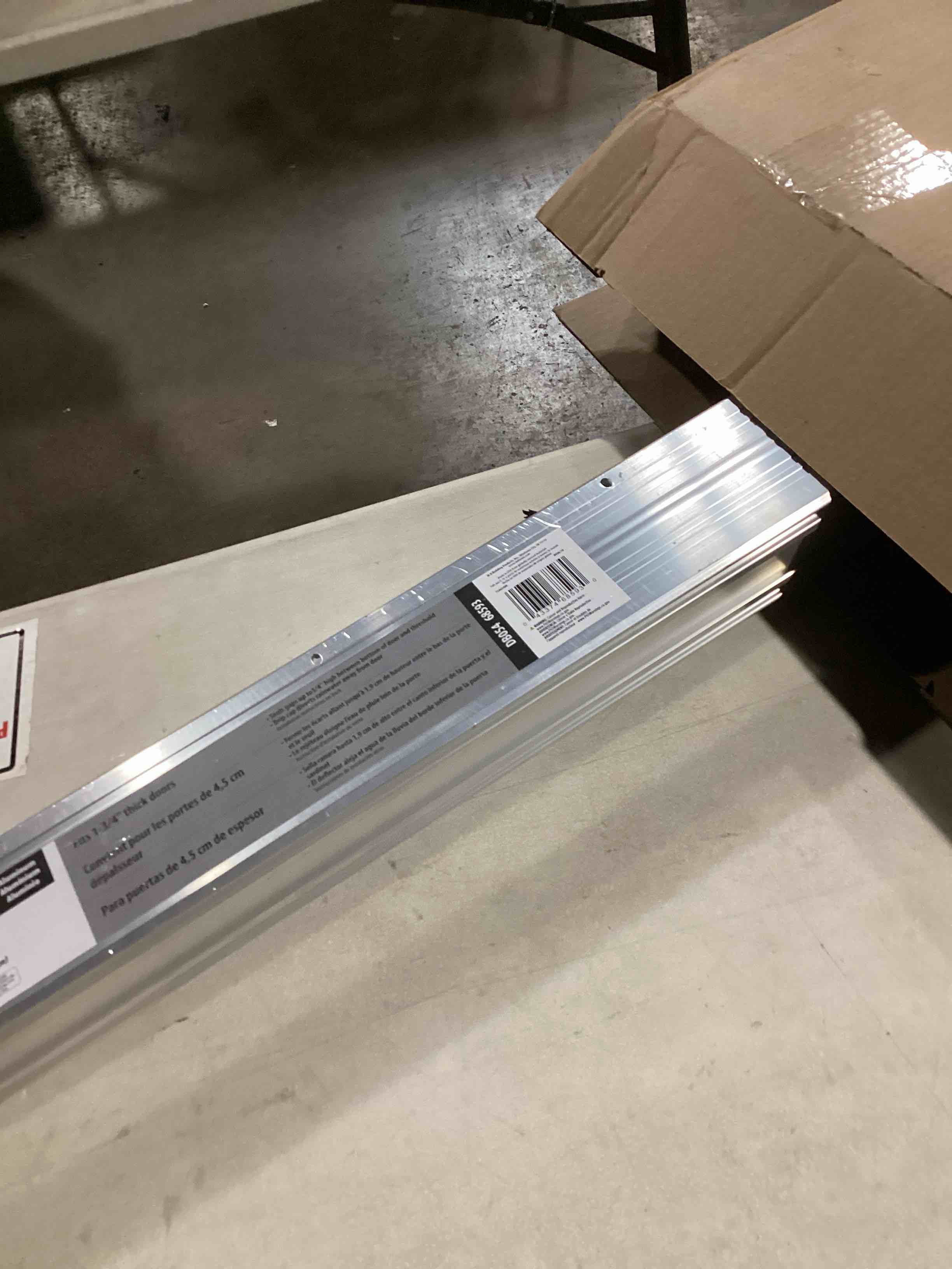 M-D Building Products 68593 36 in. Silver Aluminum and Vinyl U-Shape Screw-on Under Door Seal with Kick Plate