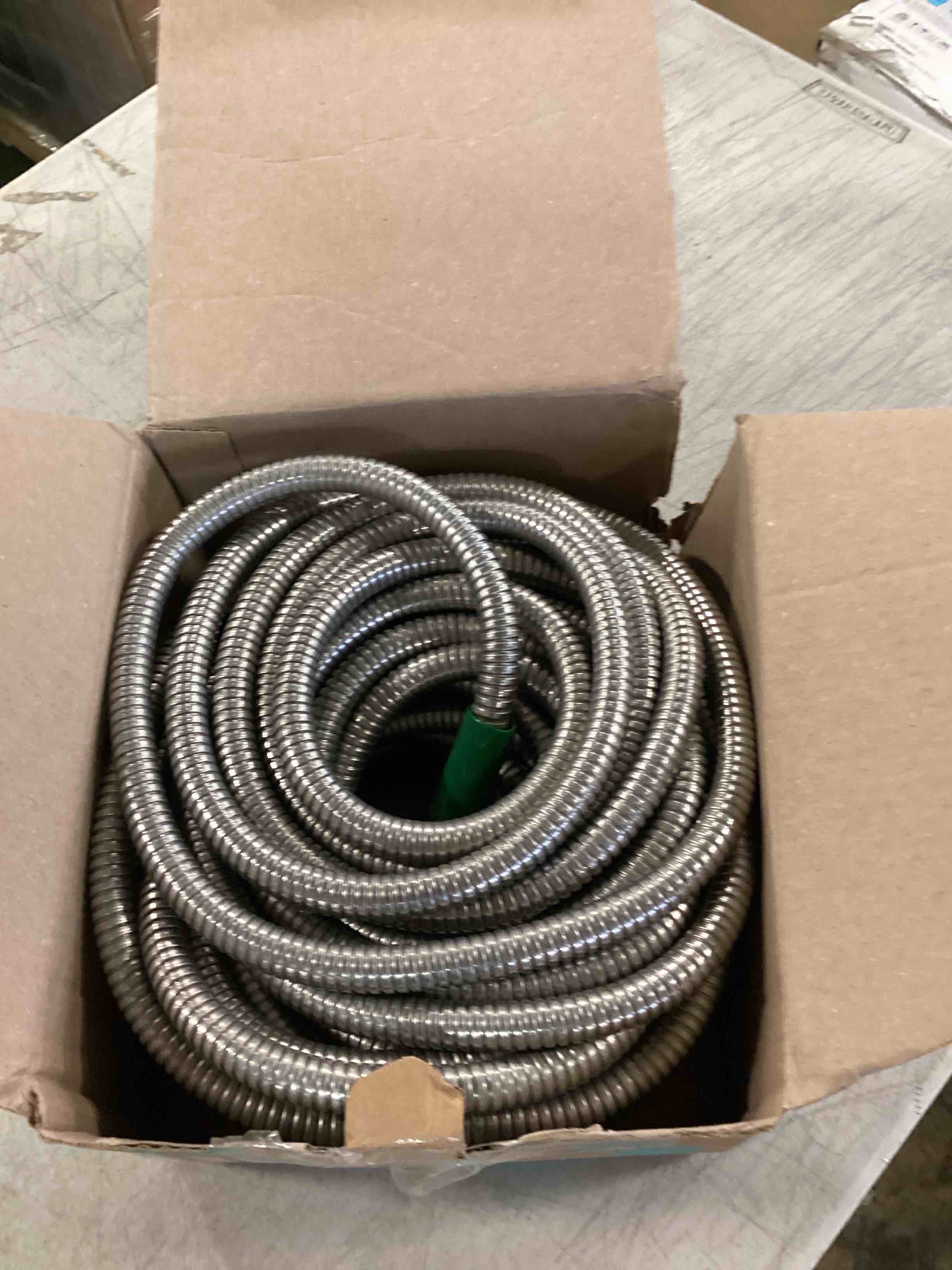 This is the only garden hose made with indestructible yet flexible stainless steel. Unlike flimsy rubber units that easily tear and tangle, this model is constructed with a 304 stainless steel alloy that resists problematic punctures, common coiling kinks, and withstands being crushed by a car. Resistant to all weather, the 3/8"-diam. hose will not burst in freezing temperatures or crack under intense heat. Its lightweight and flexible design ensures easy coiling and unrolling on a hose reel and remains cool to the touch by resisting outdoor heat and UV rays. With pressure up to 120 PSI and crush-proof aircraft aluminum fittings that ensure a firm connection to spigots and accessories. Includes fire nozzle. 75' hose. (8 1/4 lbs.)