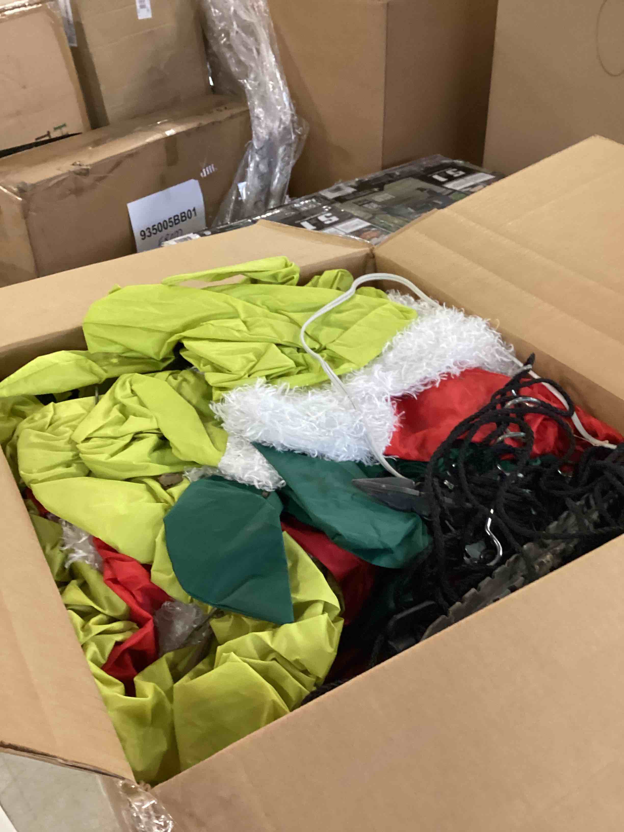 16'-tall inflatable Grinch who entertains kids and adults alike with a dazzling lightshow. Based on the 1966 animated classic, Dr. Seuss’ How the Grinch Stole Christmas, he stands wearing his custom Santa suit and toting a sack of stolen presents. An internal projector illuminates the Grinch’s body with a display of multi-colored lights guaranteed to produce smiles from Whos and guests. Five LEDs illuminate his interior while 12 included stakes and tethers prevent him from wandering up to Mt. Crumpit. A built-in air blower inflates the Grinch in minutes and provides constant inflation. Made from tear-resistant polyester. AC plug. Inflated 16' H x 6' W x 4 3/4' D, deflated 15 3/4" H x 19" W x 15 3/4" D. (11 lbs.)