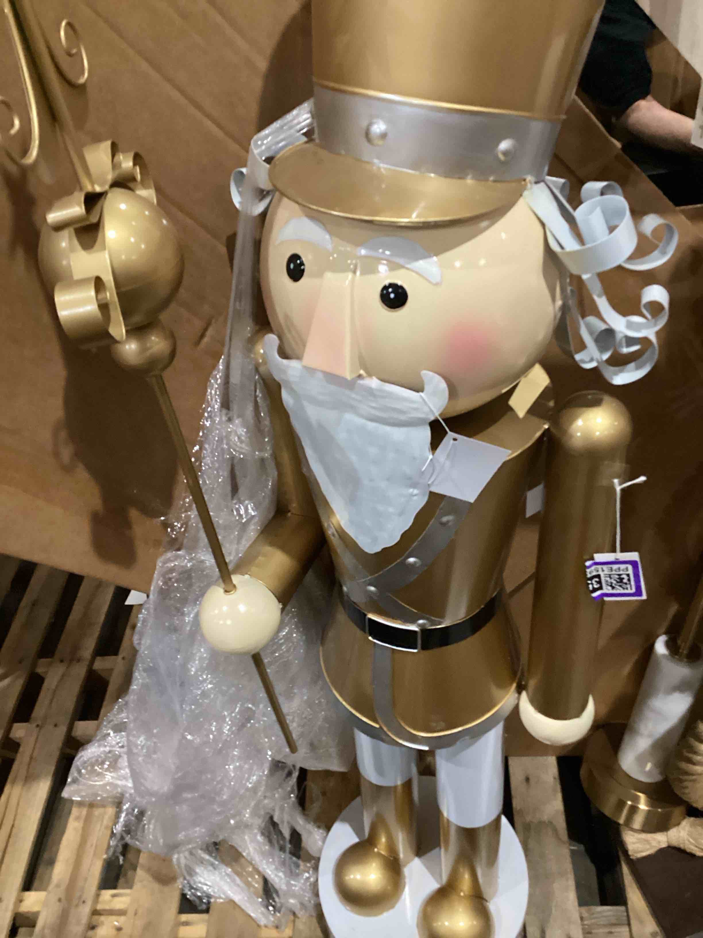 Gold Metal People Tall Floor Holiday Nutcracker Decorative Christmas Sculpture with White and Silver Accents, 17" x 16" x 58"