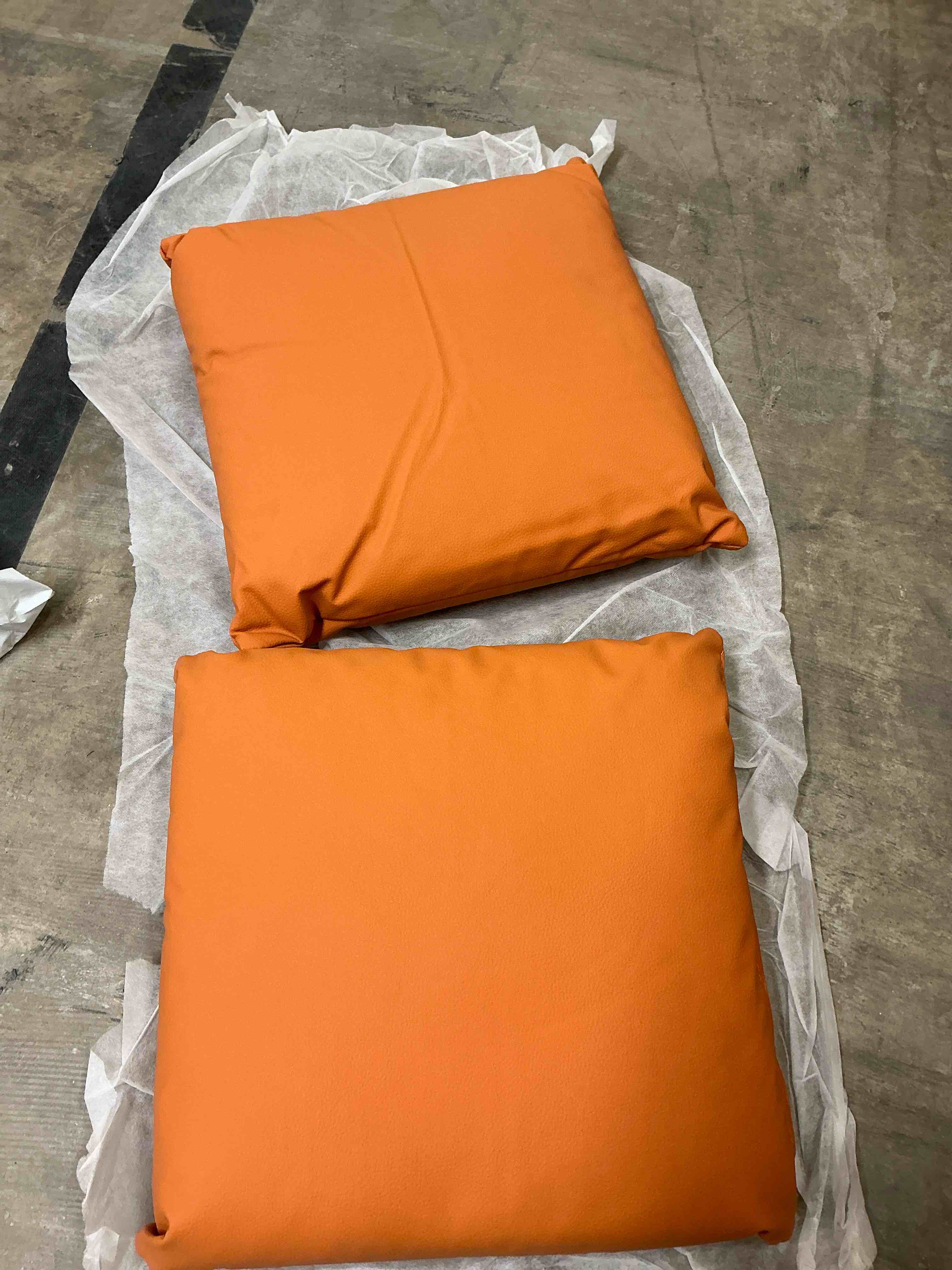 Set of two orange leather cushions(2 pieces) 