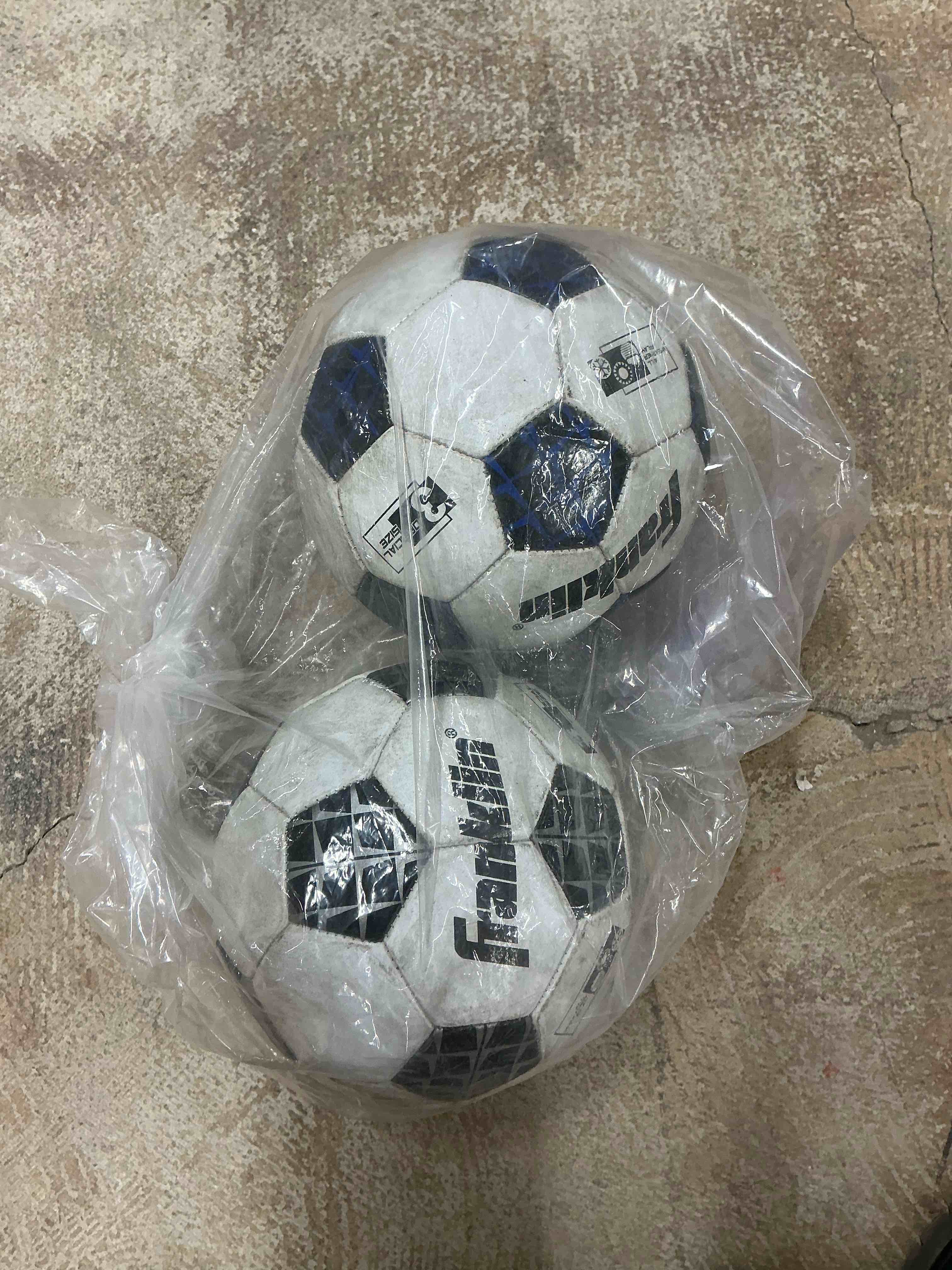 Of various items, 2 soccer balls, 1 bathroom mat