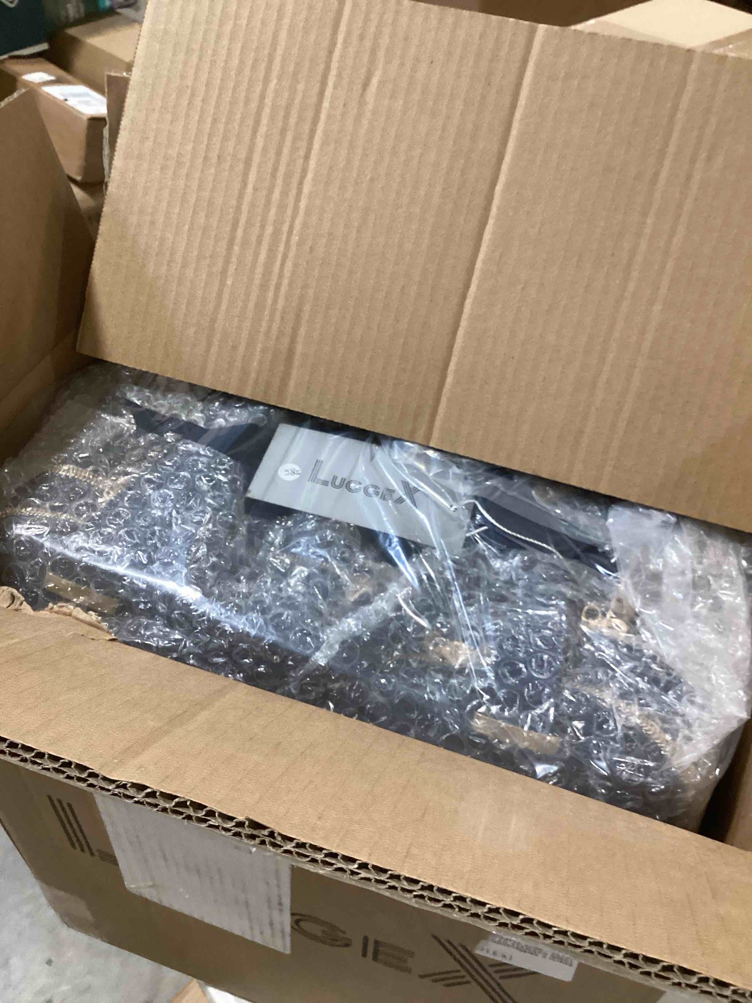 https://s3.amazonaws.com/lotting-images-prod/bidfta/PPE1728336_1748360564299.jpeg
