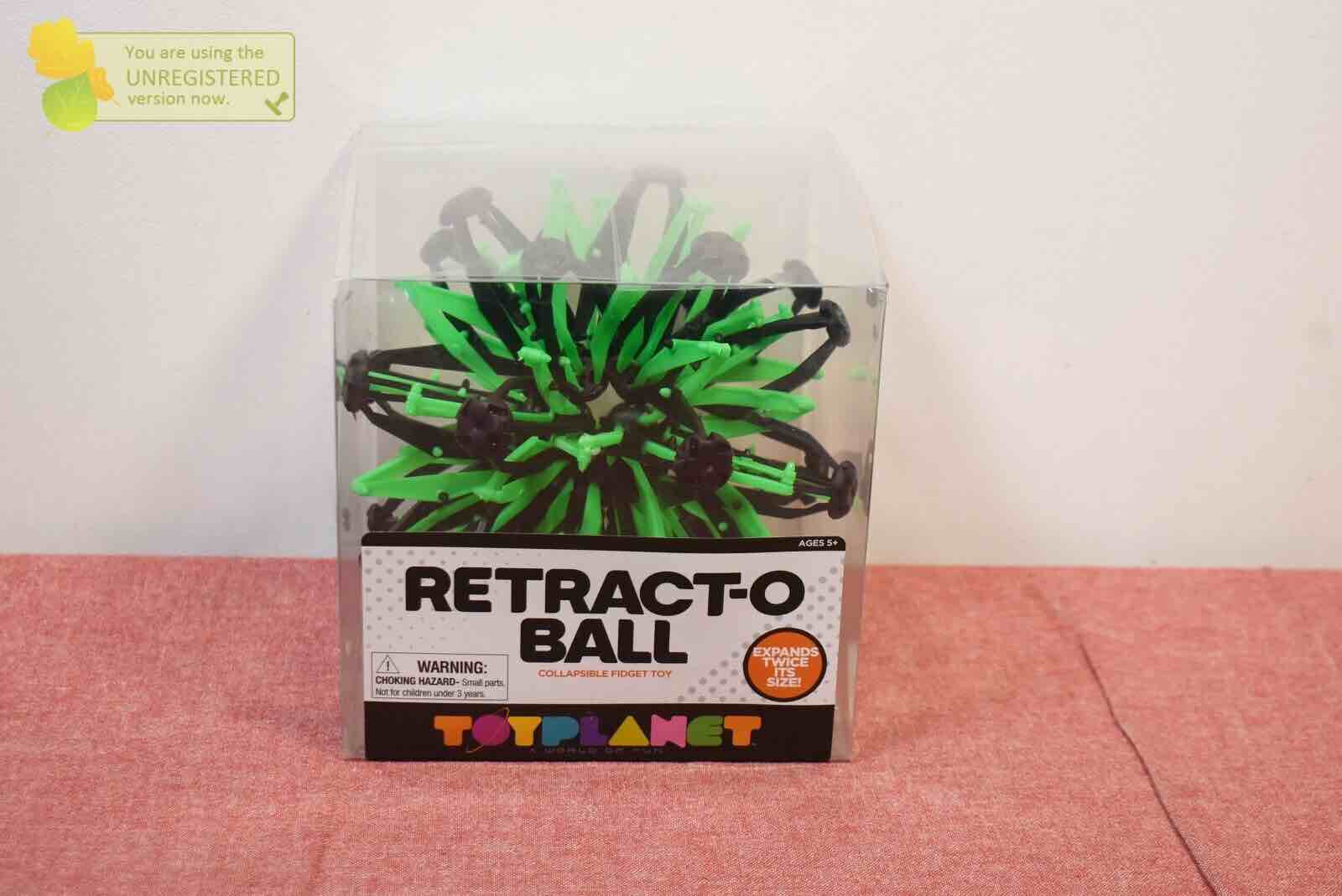 Toy Planet Retract-O Ball Collapsible Fidget Toy, Green/Black