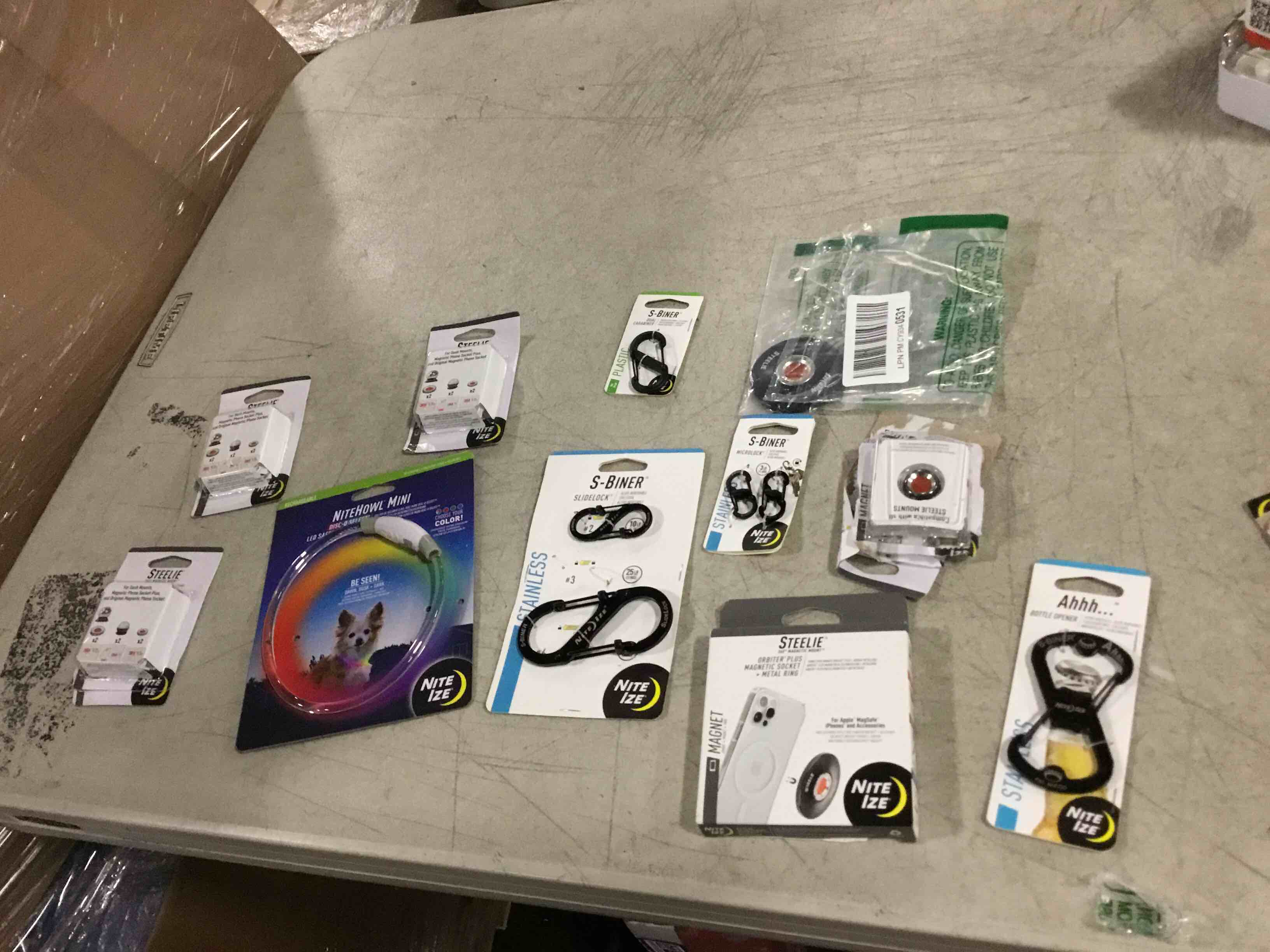  12 Assorted Nite IZE ITEMS INCLUDES 360 degree magnetic mount, S-BINDERS, BOTTLE OPENER, 