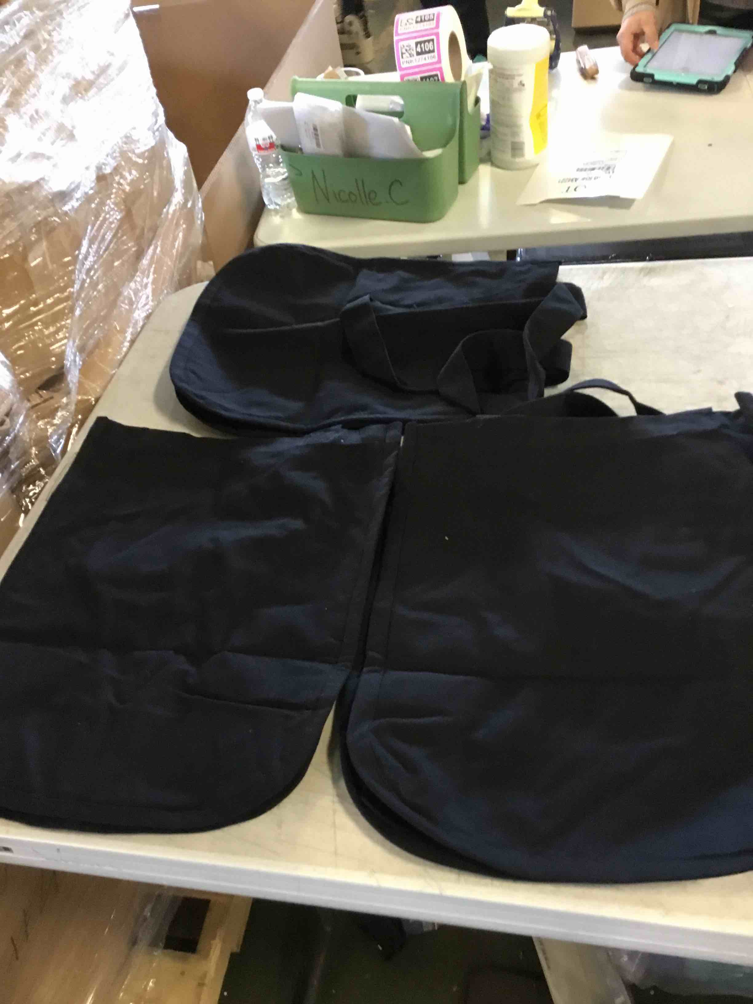 3 black canvas tote bags with rounded bottom 