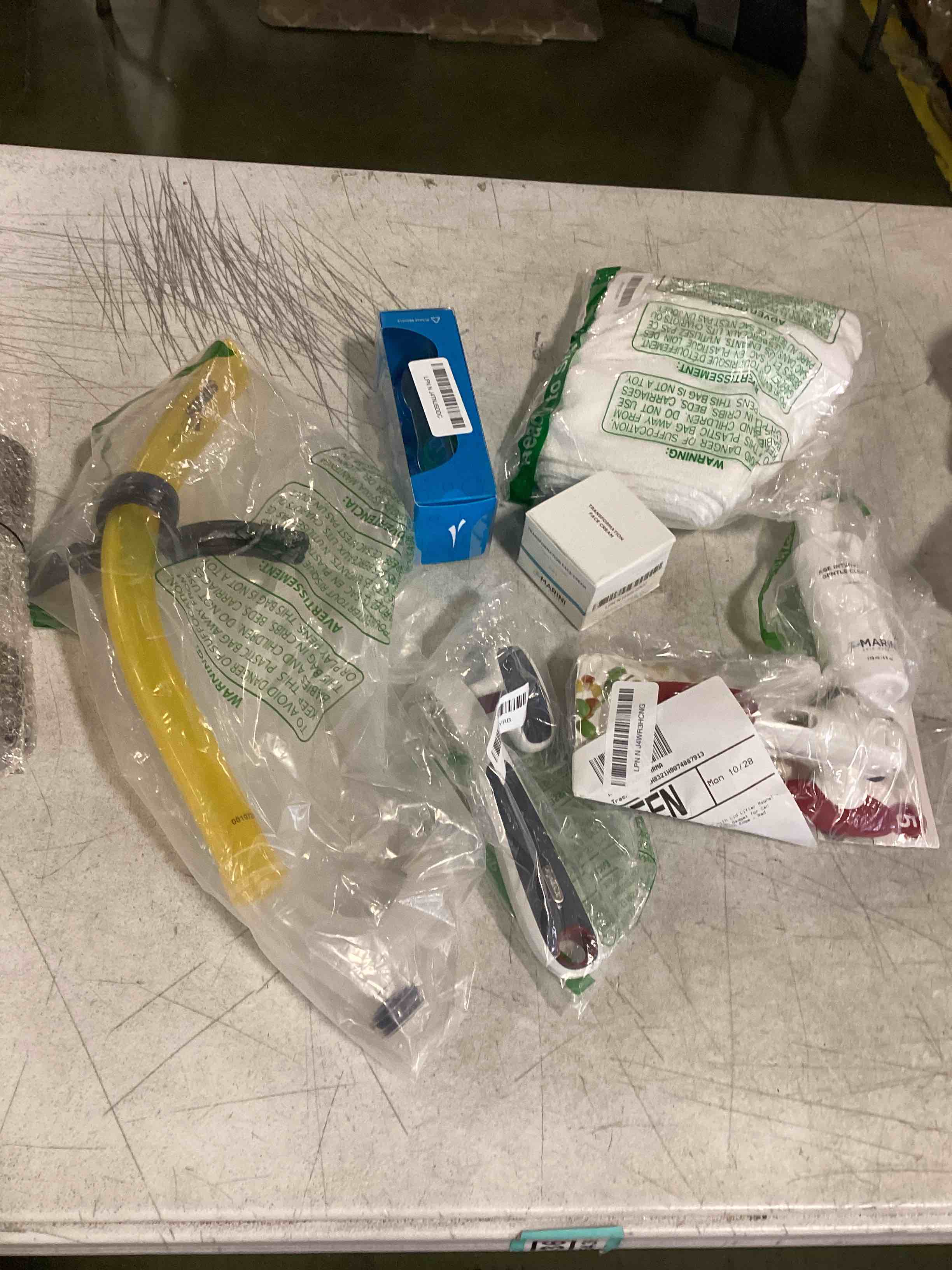 Assorted different products include kitchen accessories, hand towels and more 8 pcs 