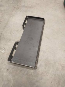 skid loader, hook to trailer