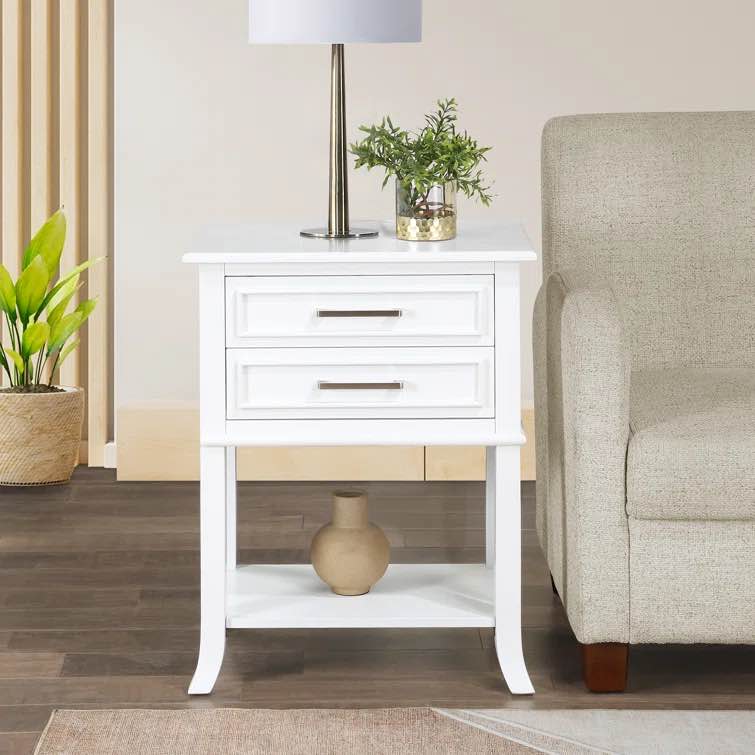 Johnessa 2 Drawer End Table with Shelf with Solid Wood Legs white Overall 28.75'' H X 22'' W X 15.25'' D Shelf 11.42'' H Tabletop Thickness 0.5'' Overall Product Weight 36 lb. Assembled product dimensions (W) 22 in. x (D) 15 in. x (H) 28 in.