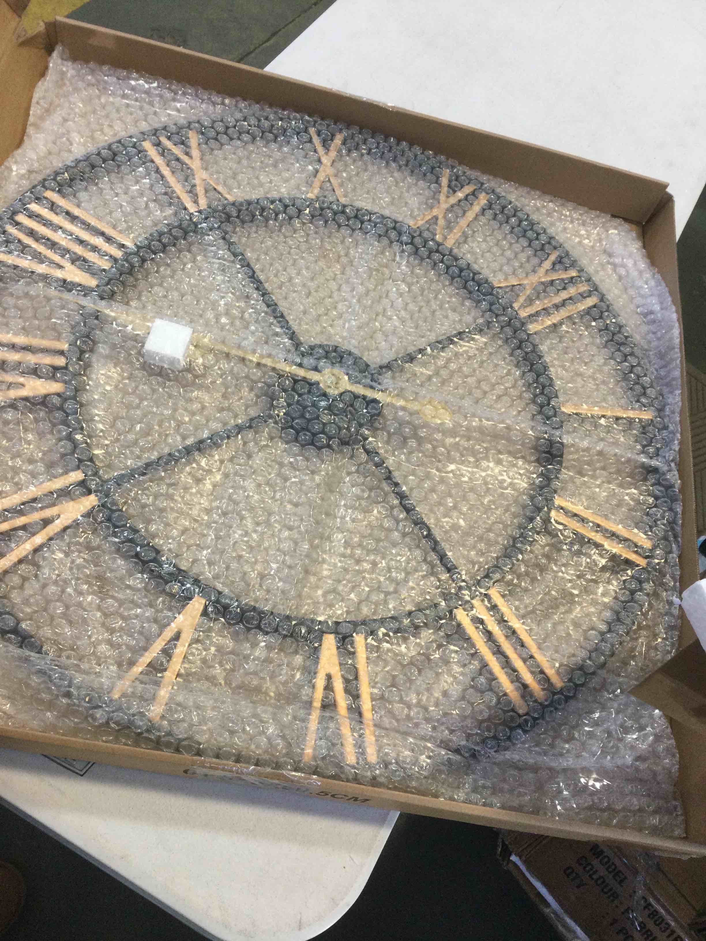Condition photo showing New/Like New for 24 Inch Large Oversized Farmhouse Modern Decorative Wall Clock for Living Room,Silent Industrial Big Roman Numerals Vintage Metal Round Wall Clocks for Kitchen,Dinng Room,Office Black Roman 24 inch
