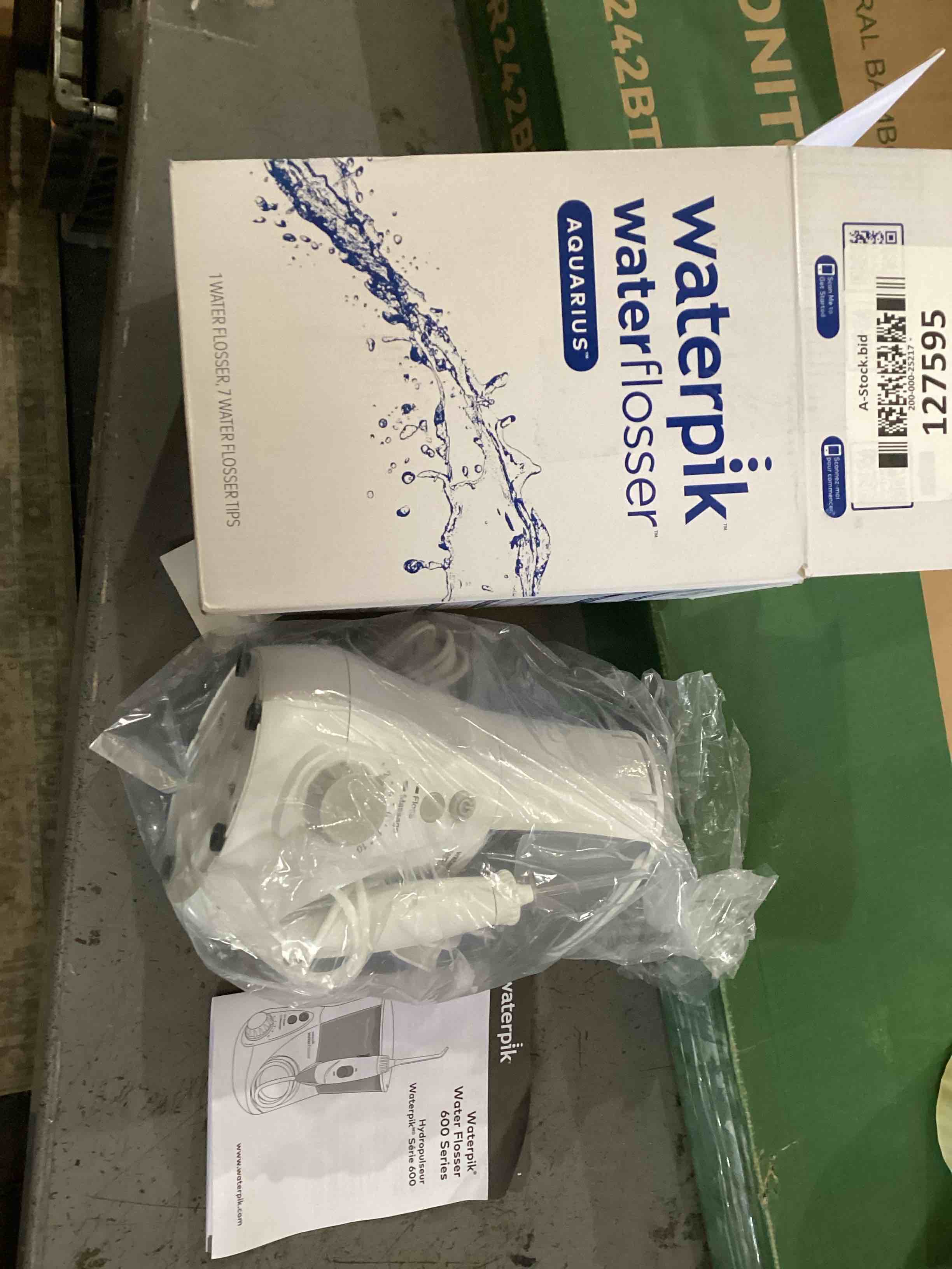 Condition photo showing As Is for Waterpik Aquarius Water Flosser For Teeth Cleaning, Gums, Braces, Dental Care, Electric Power With 10 Settings, 7 Tips For Multiple Users And Needs, ADA Accepted, White WP-660, Packaging May Vary