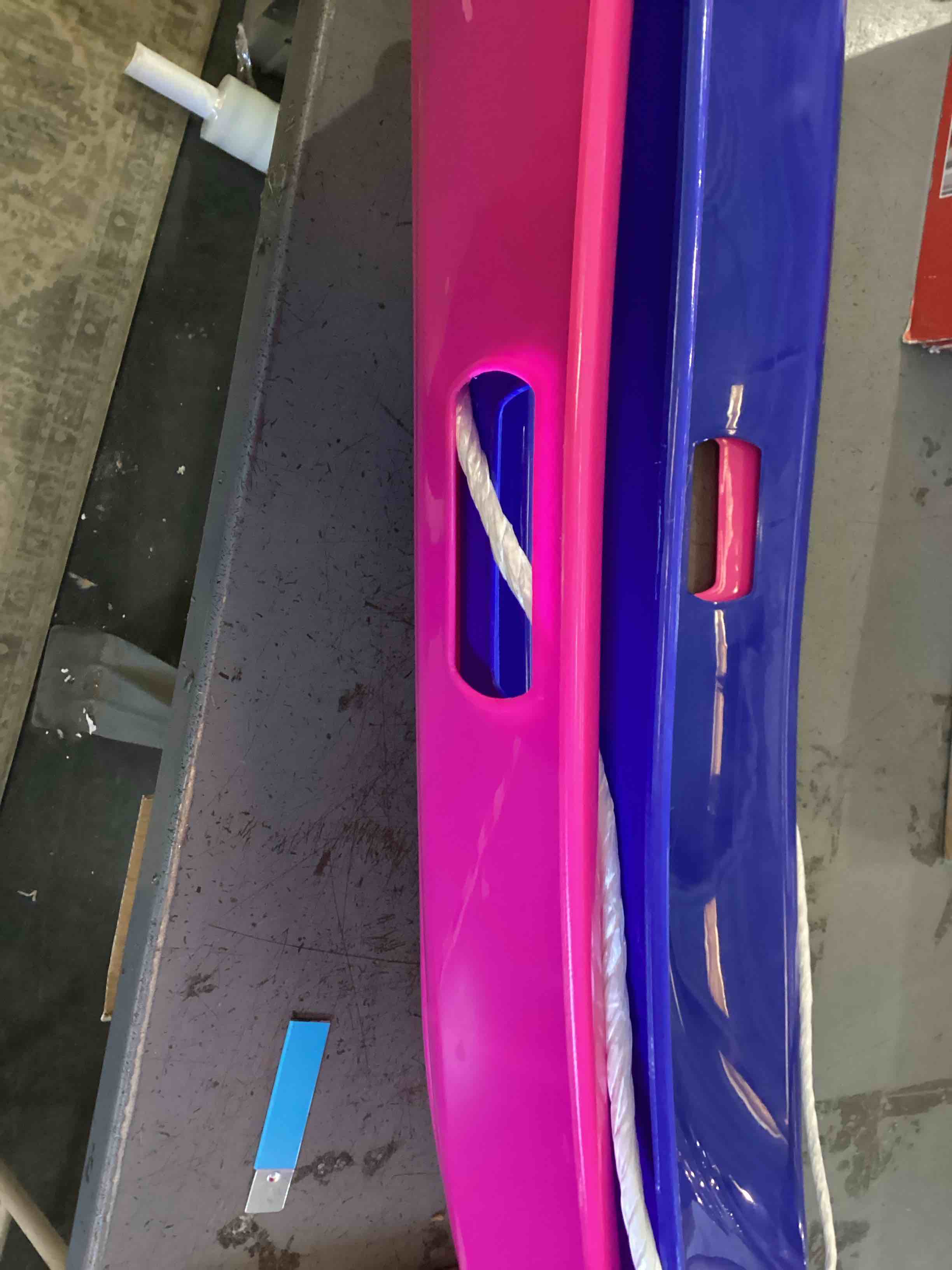 Condition photo showing As Is for Plastic Sleds, Blue and Pink, Set of 2