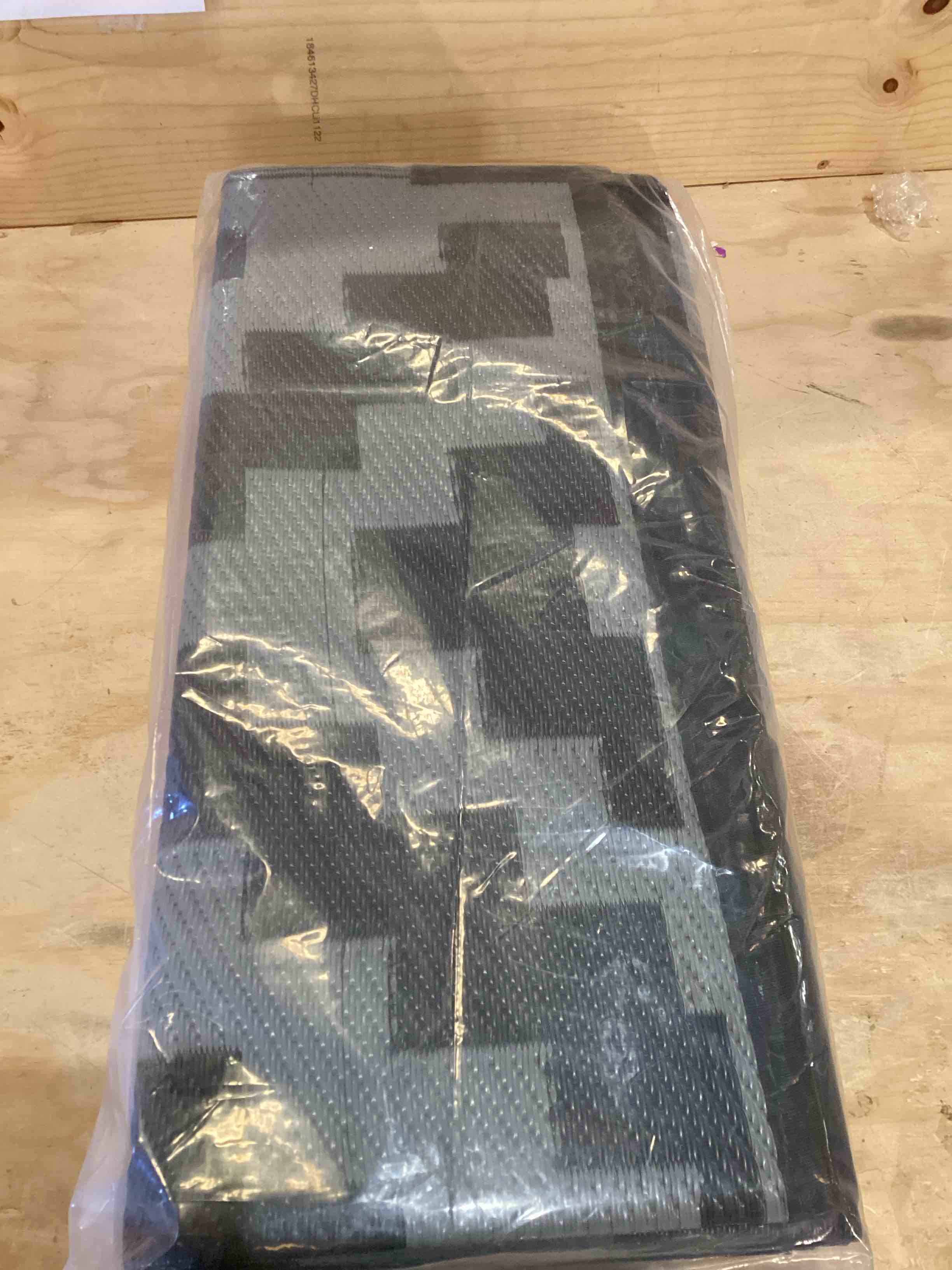 Condition photo showing Good Condition for Smiry Waterproof Outdoor Rug 9x12 ft, Reversible Plastic Straw Patio Camping Rugs, Outdoor Indoor RV Mat Carpet for Patio, Outside Entry, Backyard, Deck, Bench, Picnic, Camper, Black & Grey Black and Grey 9' x 12' (Rectangular)