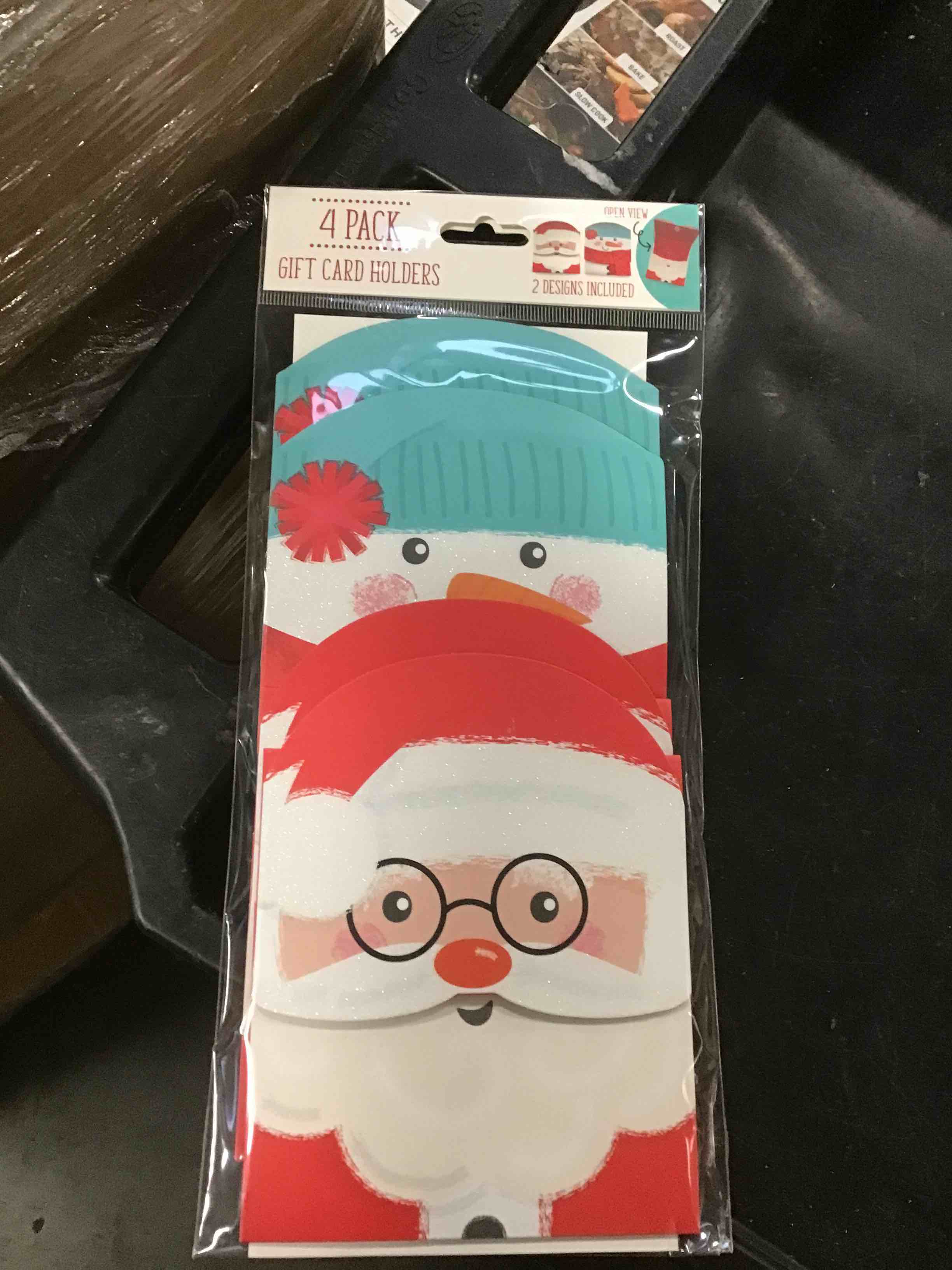 This is a 4- pack of Christmas-themed gift card holders
