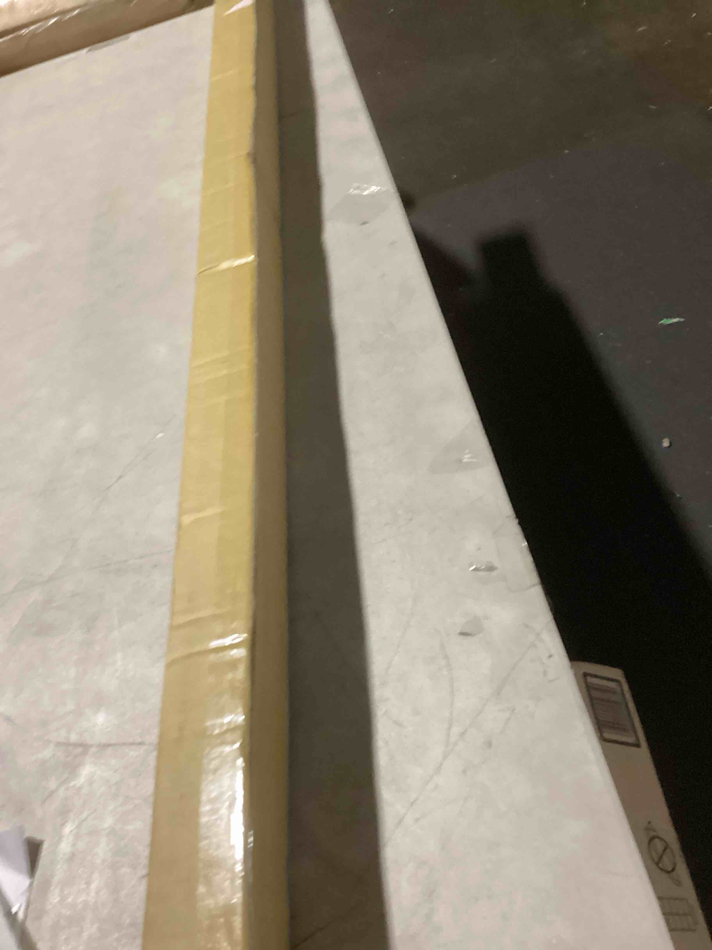 Condition photo showing Good Condition for DEZ FURNISHINGS Cordless 1.5" Light Filtering Cellular Shade, 69.5" W x 48" H, Anchor Gray Anchor Gray 69.5"W x 48"H