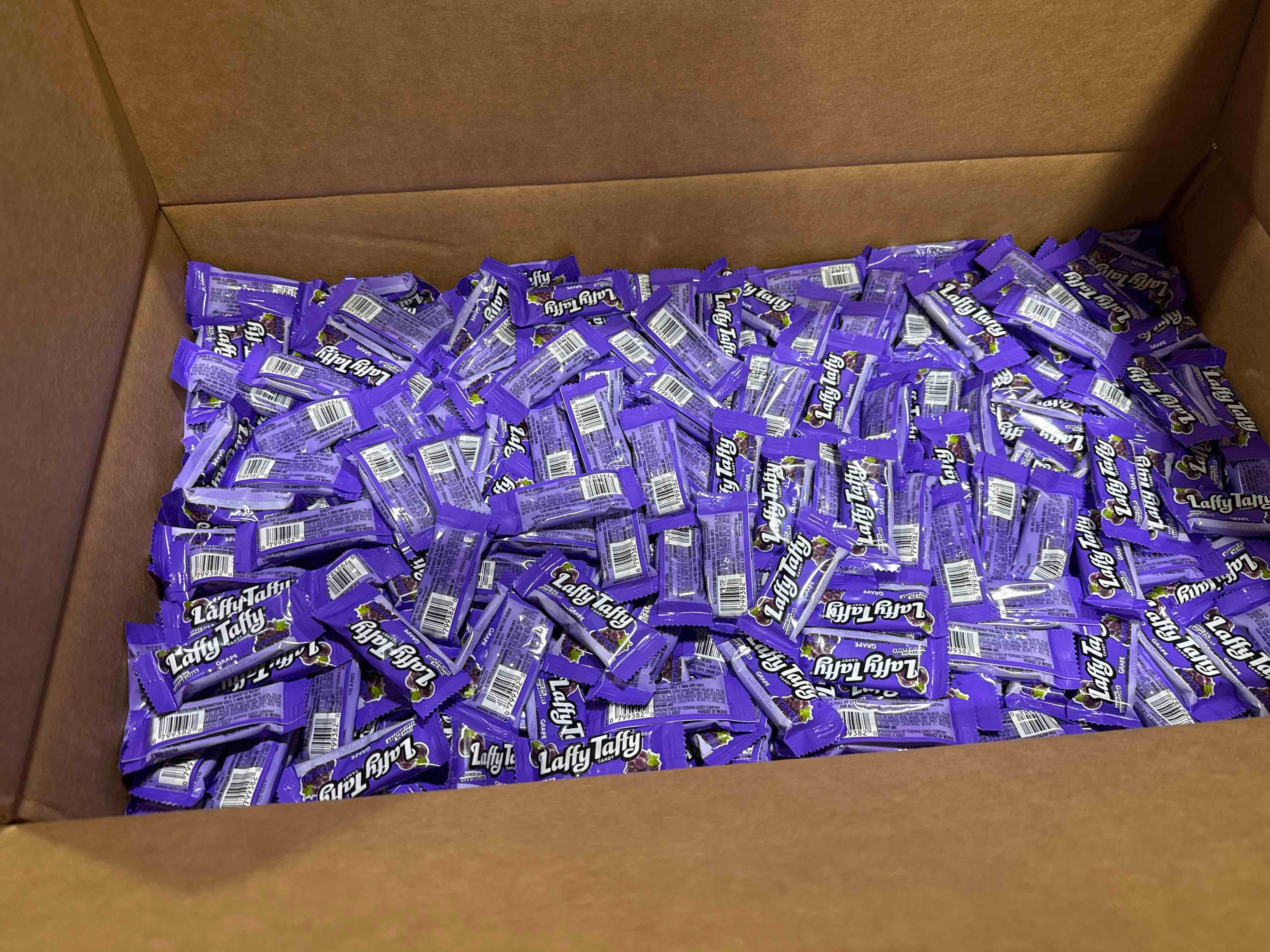 Condition photo showing Brand New for 24 LB pounds of grape Laffy taffy Best by apr 2022