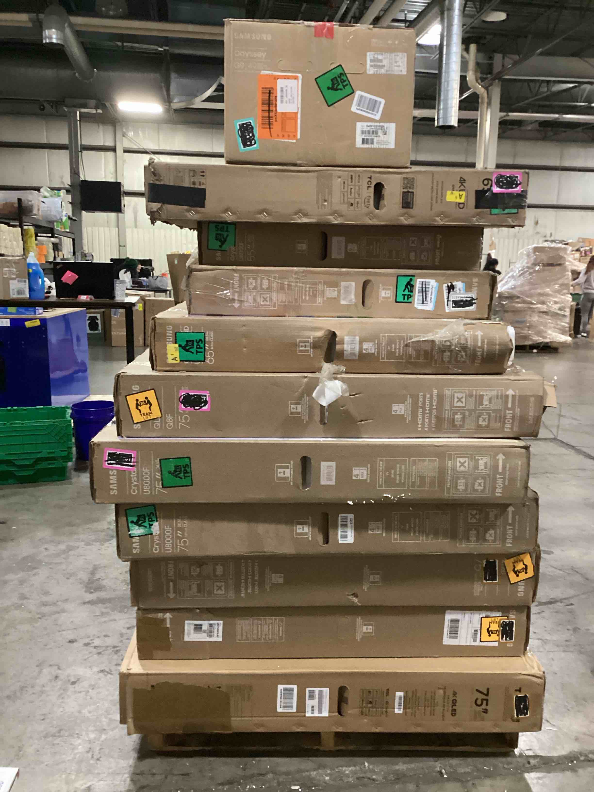 pallet of defective electronics for parts