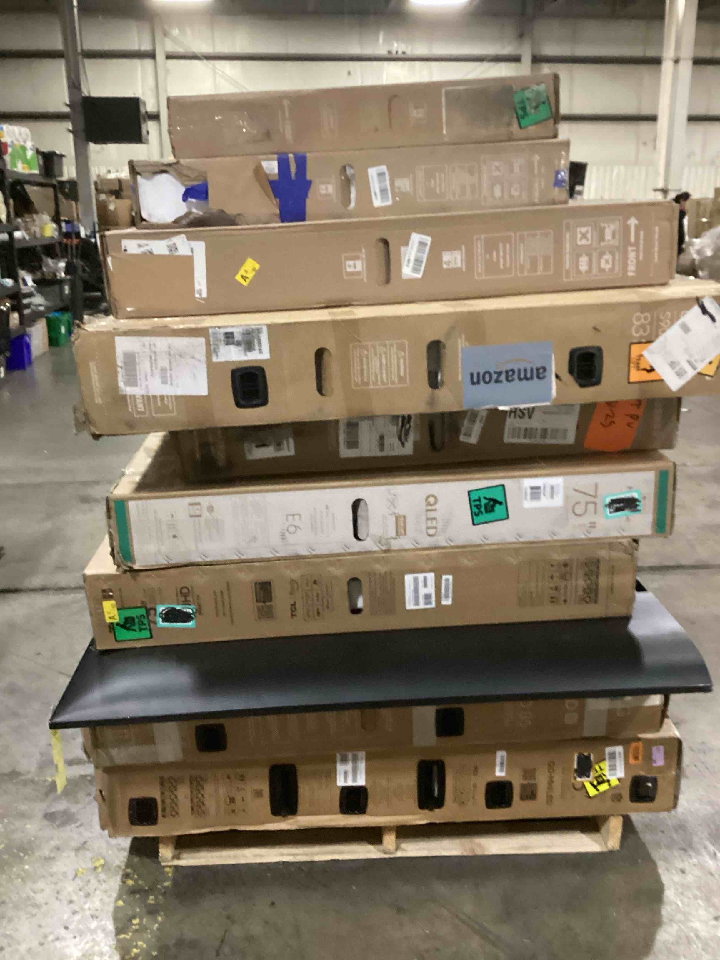 pallet of defective electronics for parts