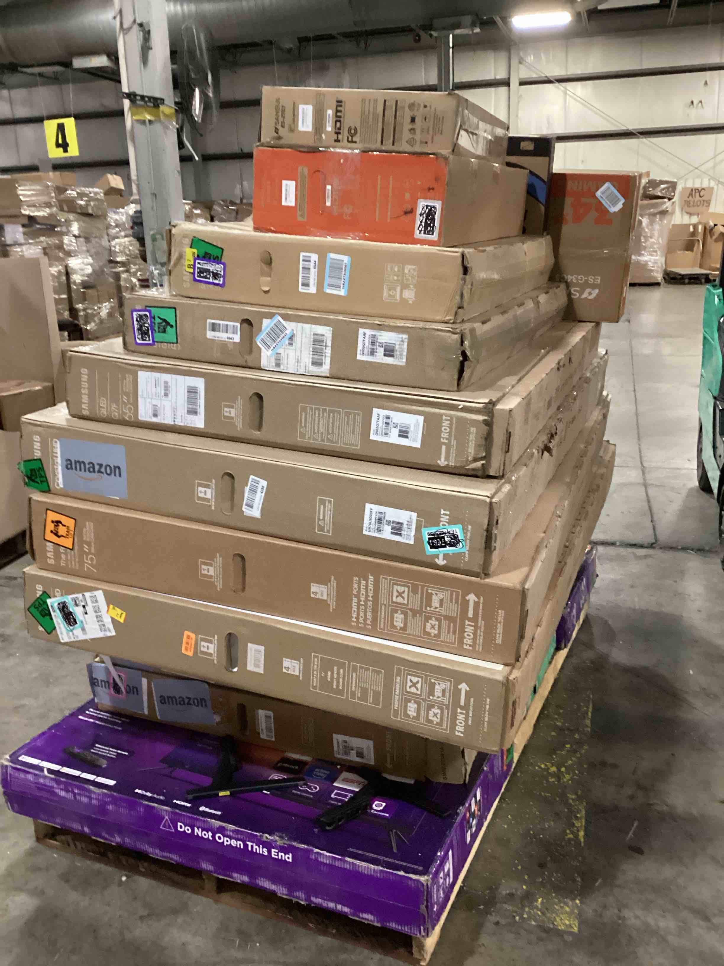 pallet of defective electronics for parts 